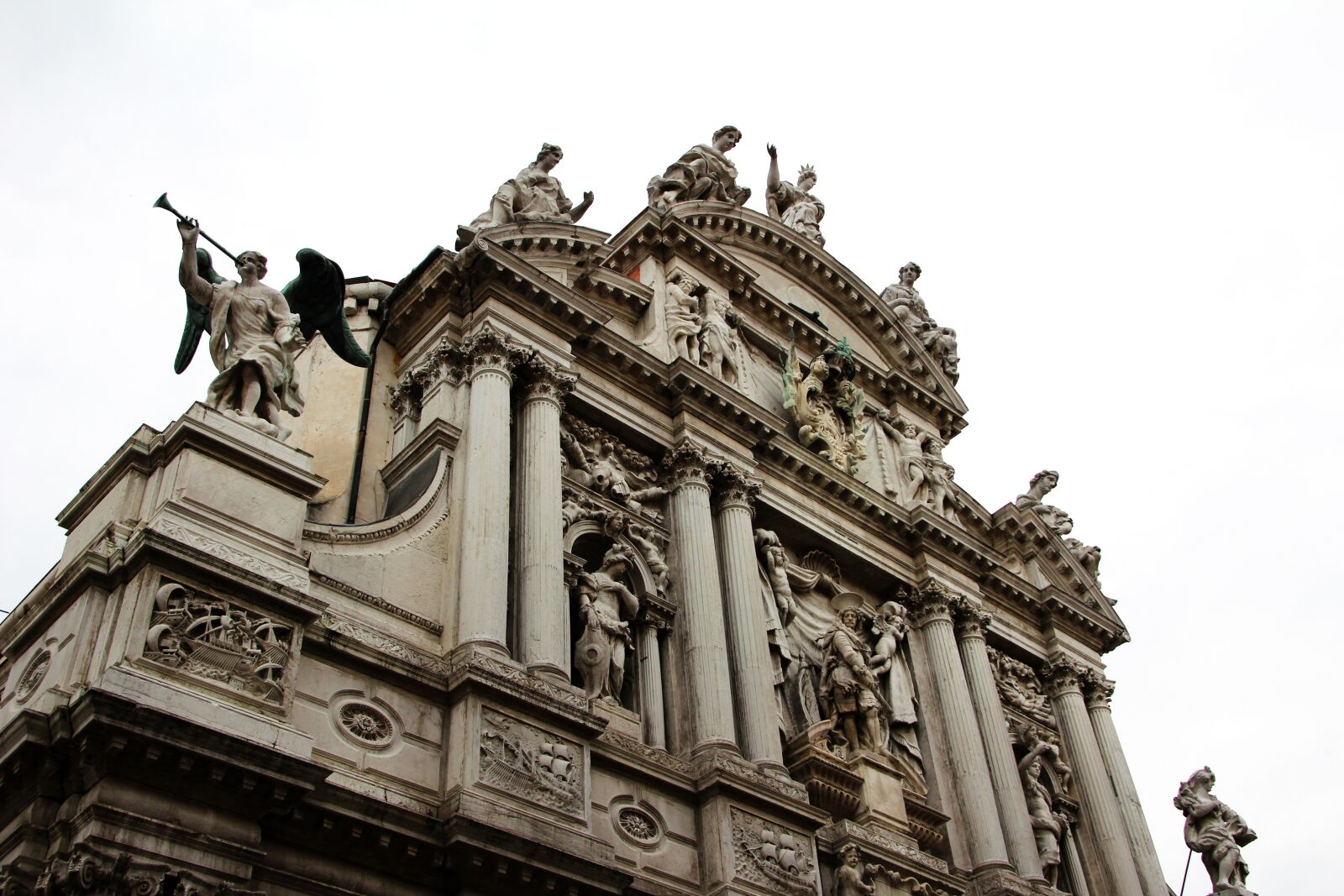 Canon EOS 60D sample photo. Stucco fa ade, figures photography