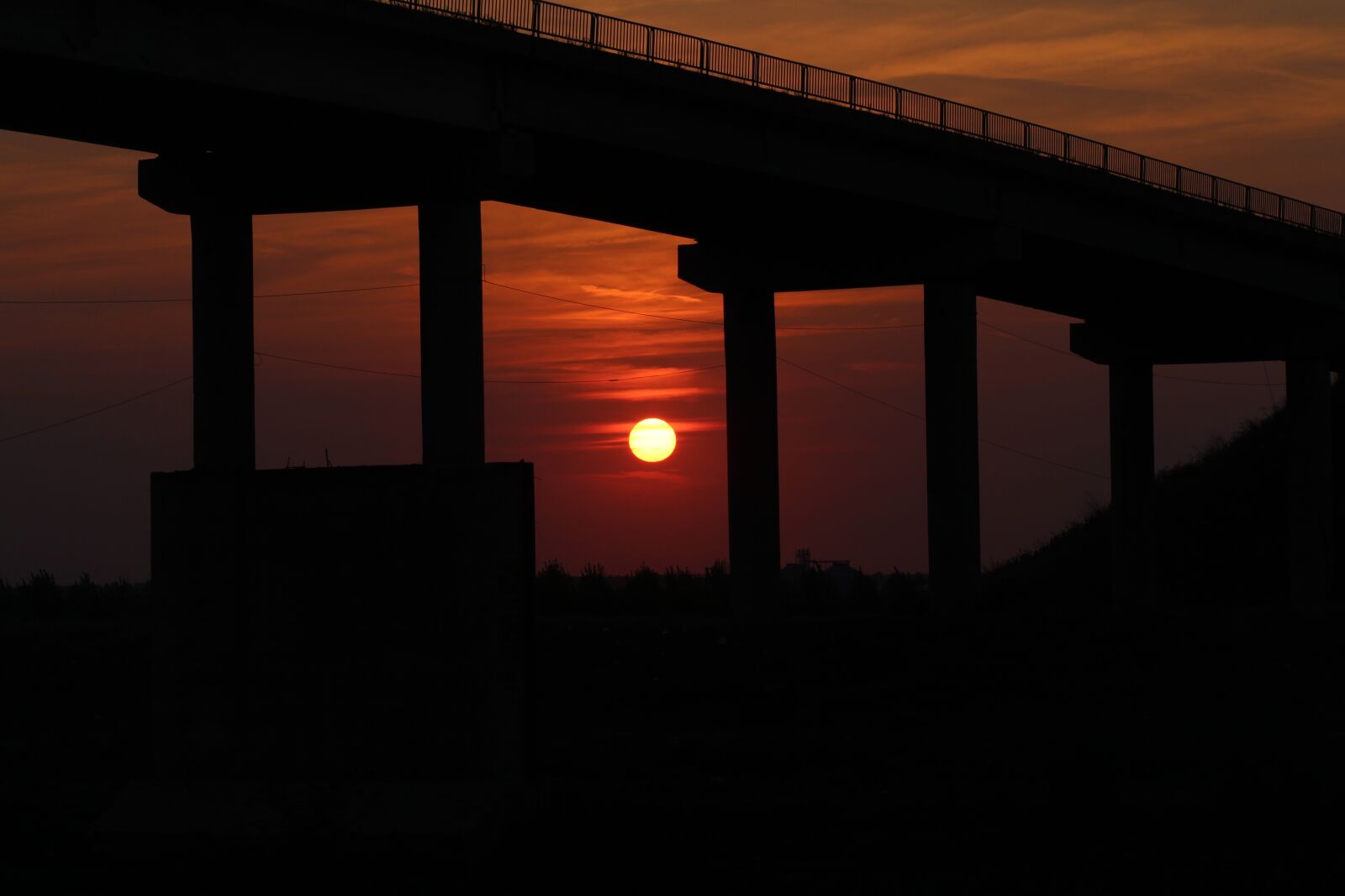 Canon EOS 700D (EOS Rebel T5i / EOS Kiss X7i) + Canon EF 85mm F1.8 USM sample photo. Sunset, bridge, sky photography