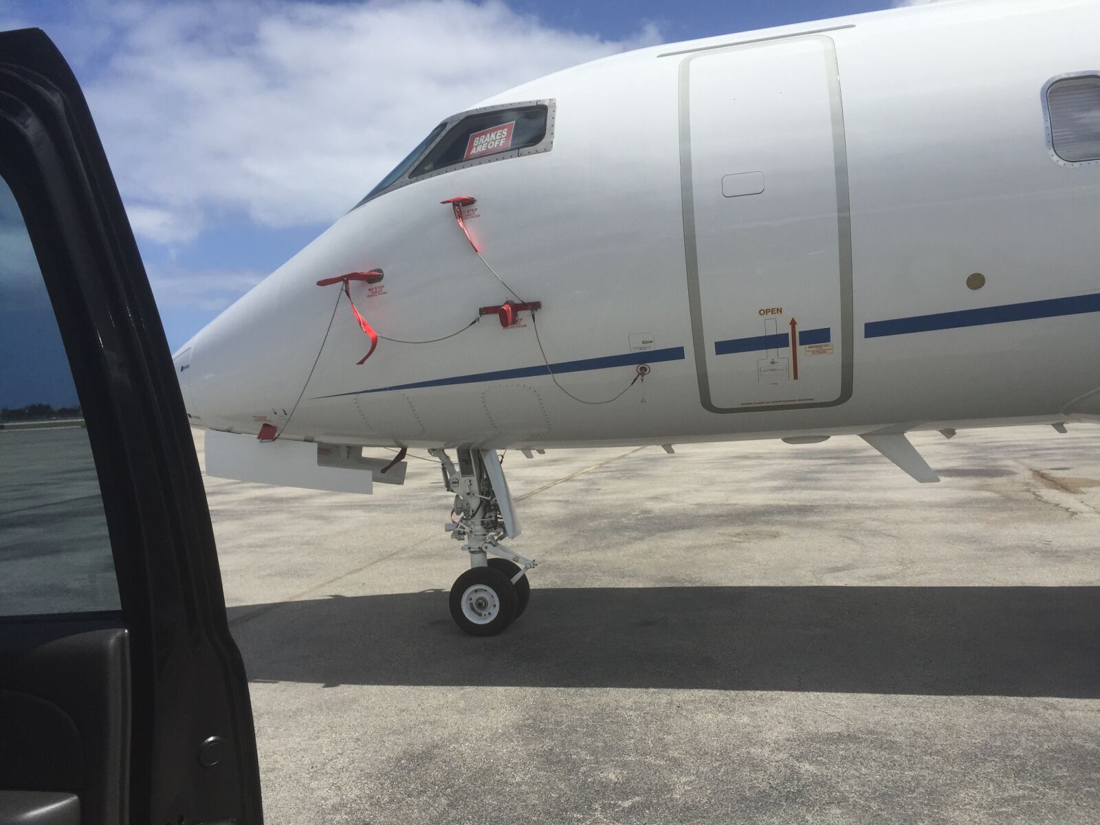 iPhone 6 back camera 4.15mm f/2.2 sample photo. Airplane, landing gear, plane photography