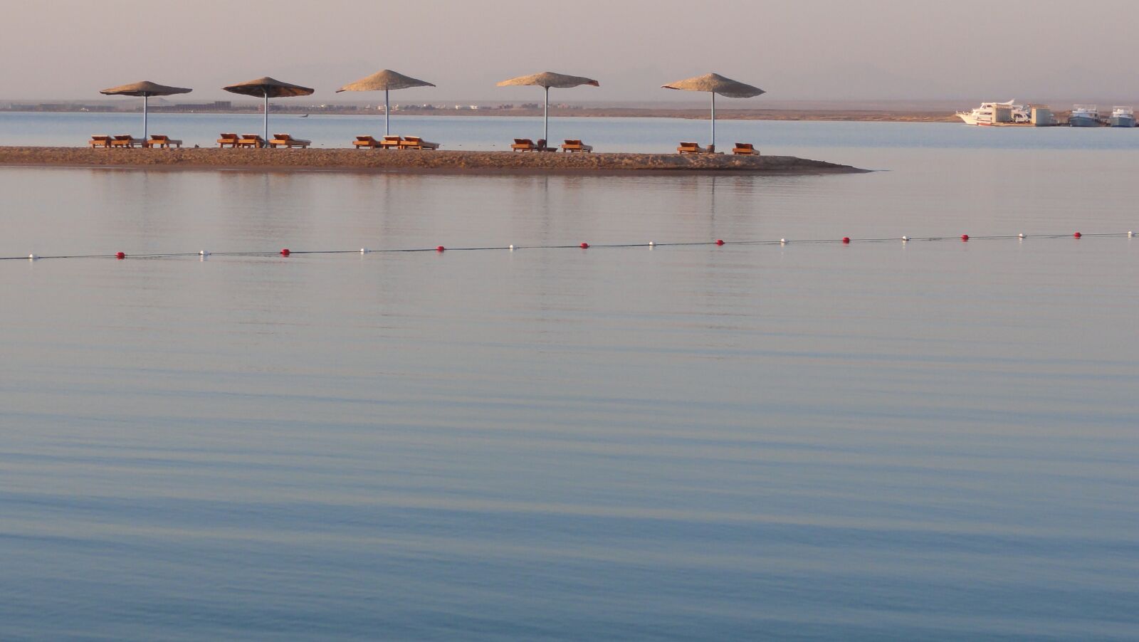 Sony DSC-HX5V sample photo. Beach, parasol, sea sun photography