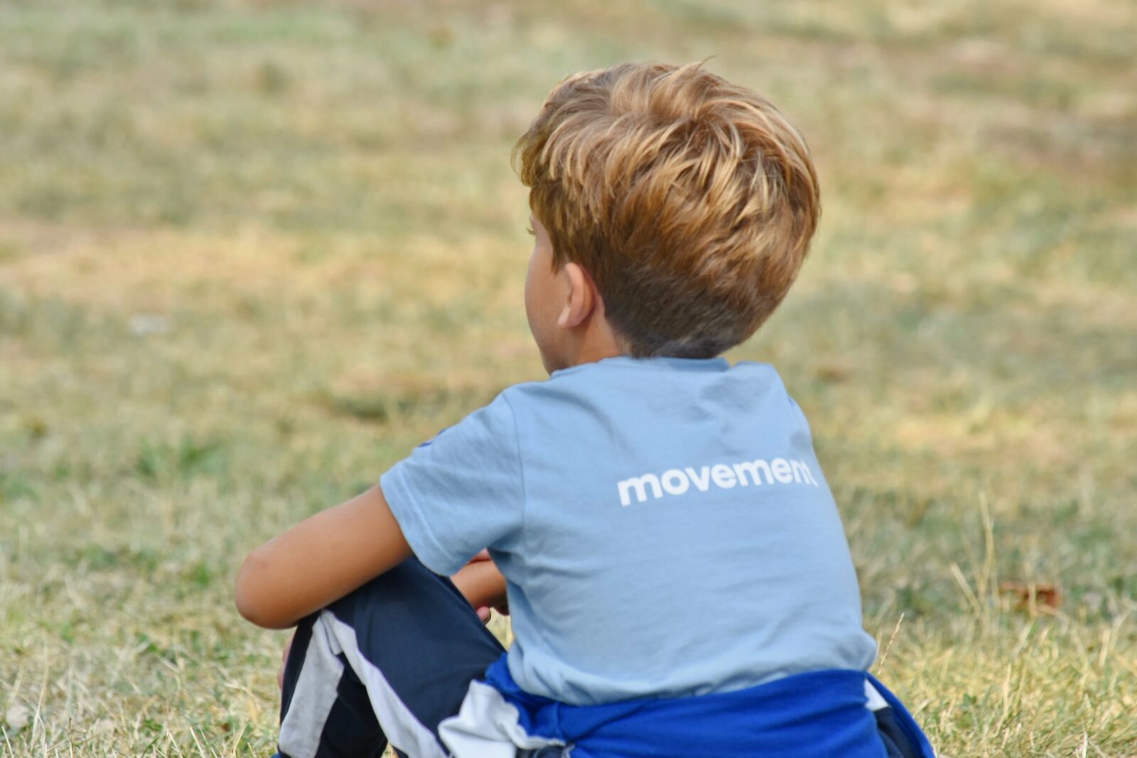 Nikon D5500 sample photo. Blonde hair, boy, relaxing photography