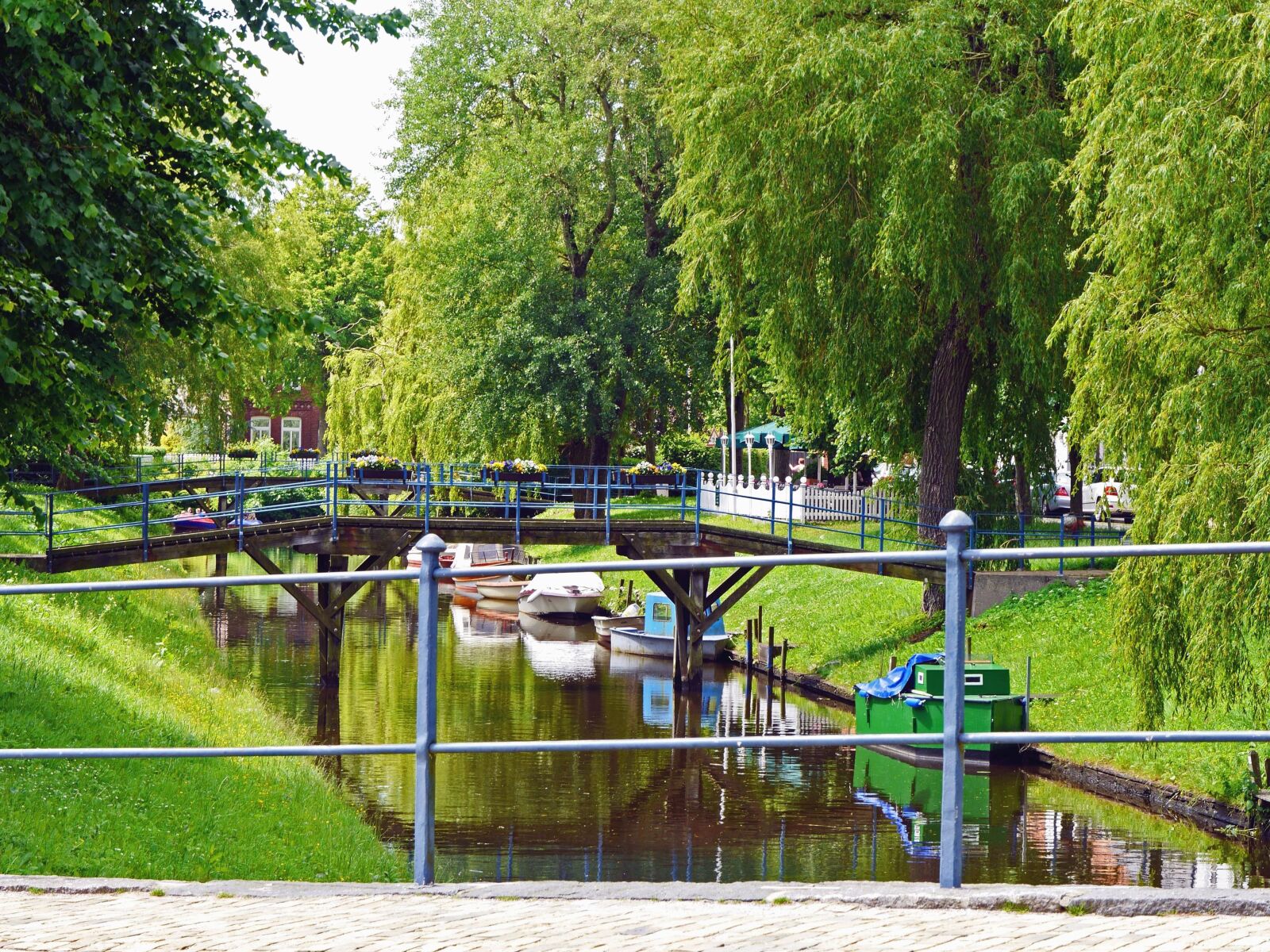 Panasonic Lumix DMC-GH3 sample photo. Bridge, river, boat, coast photography