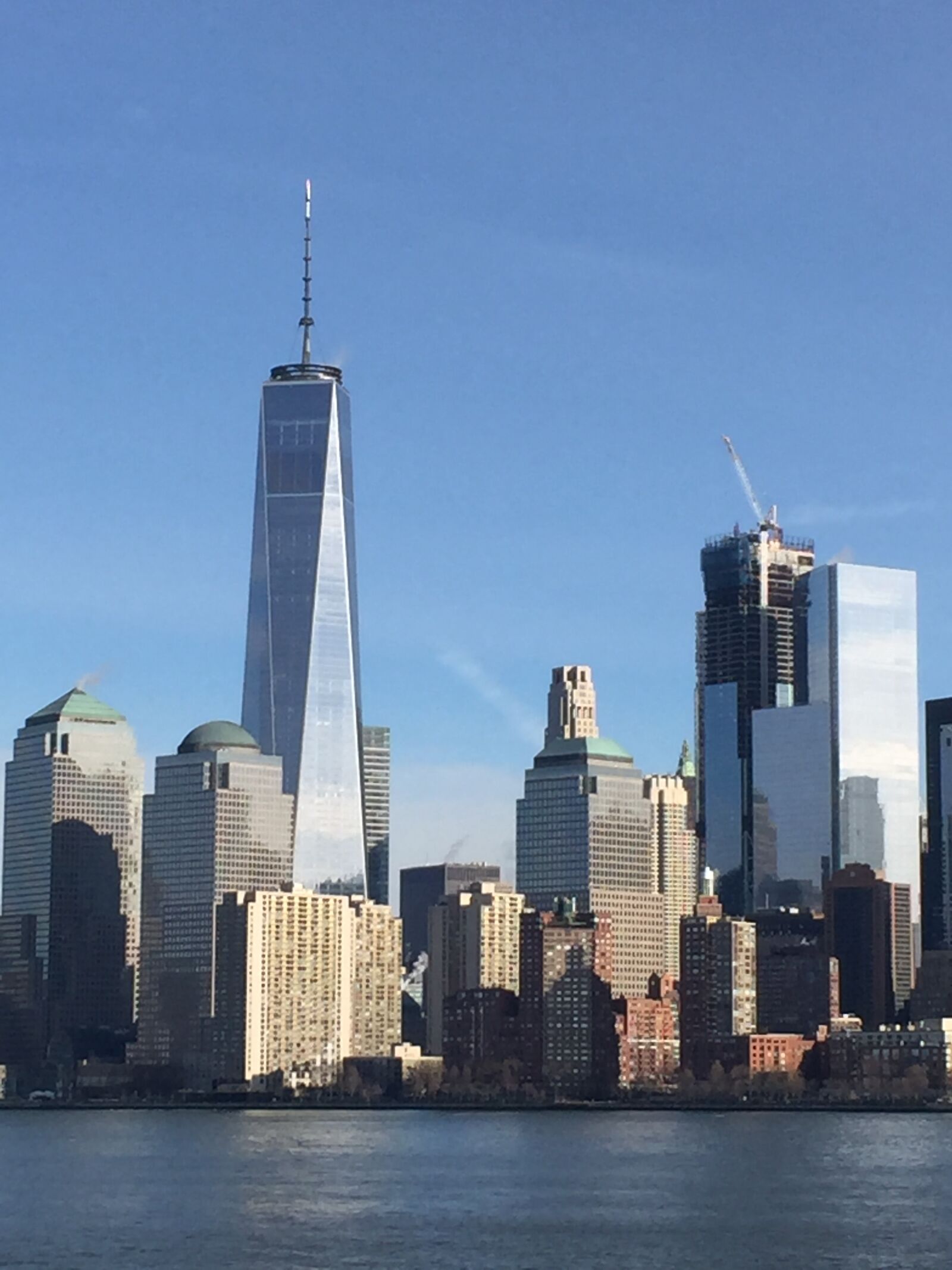 iPhone 6 Plus back camera 4.15mm f/2.2 sample photo. New, york, river, skyscraper photography