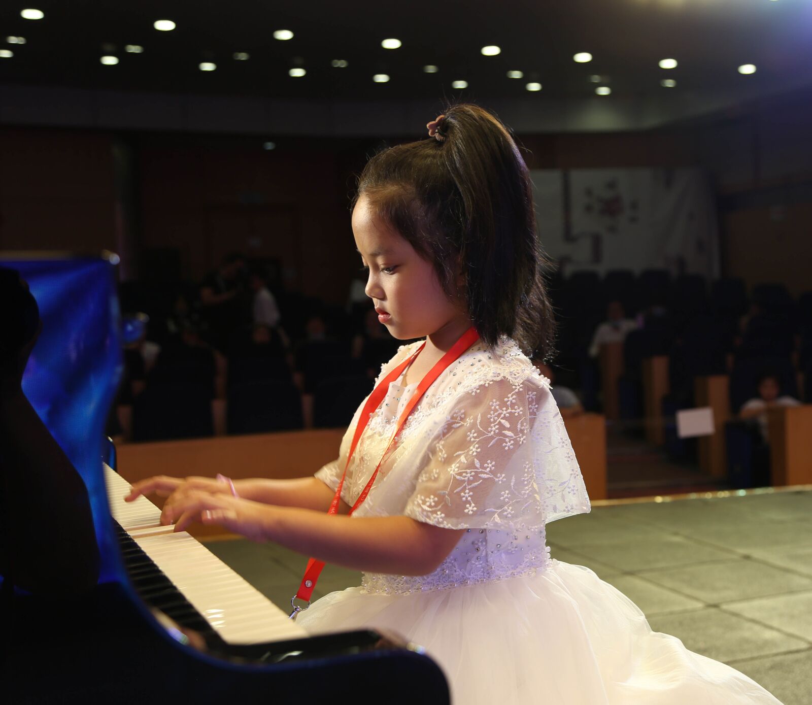 Canon EF 24-105mm F4L IS USM sample photo. Child playing piano, art photography