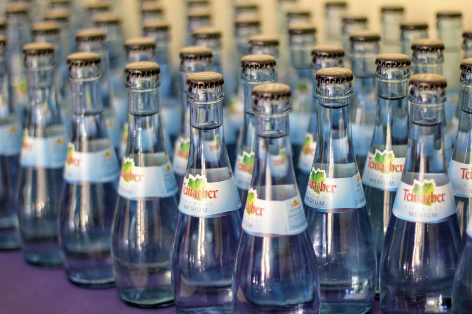Canon EOS 60D + Canon EF 50mm F1.4 USM sample photo. Supply, water, water bottles photography