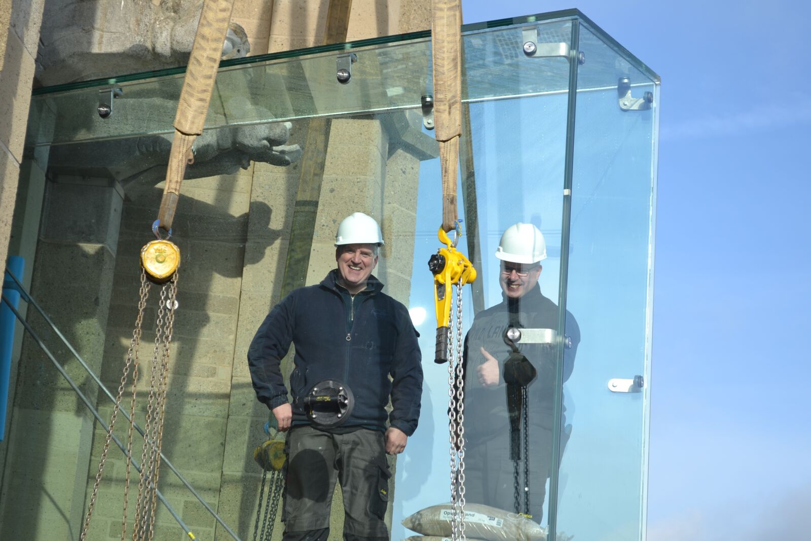 Nikon D3100 sample photo. Glass balcony, worker, construction photography