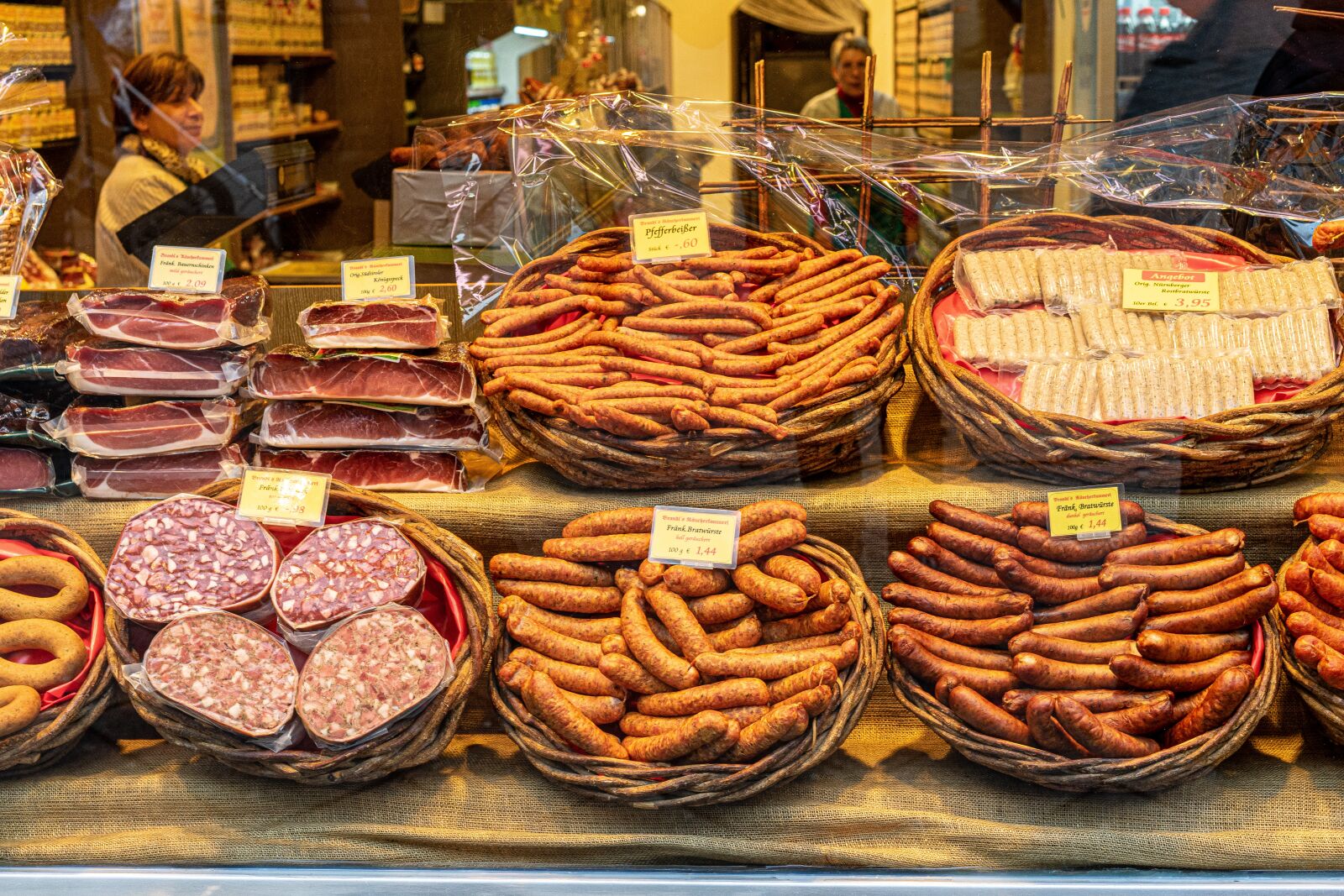 Sony Sonnar T* FE 55mm F1.8 ZA sample photo. Store, sausage, market photography