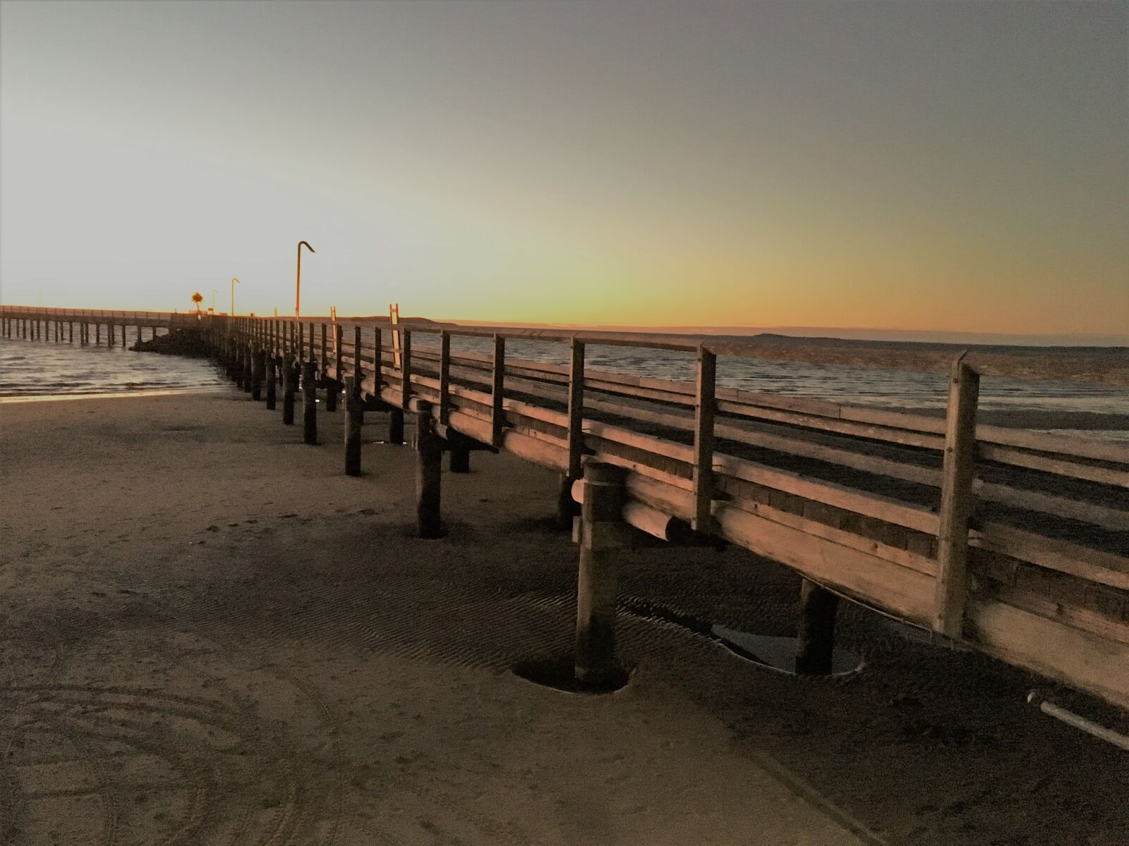 Apple iPhone 6s sample photo. Beach, jetty, sunset photography