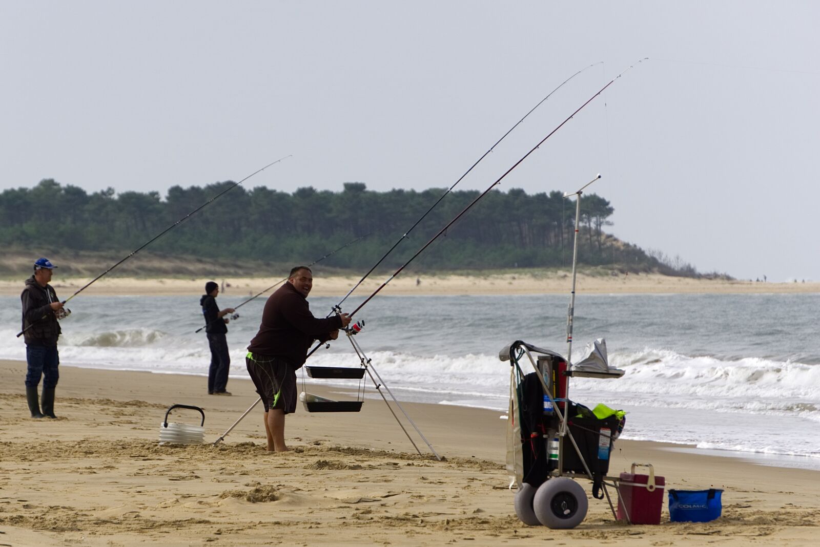 Sony E 55-210mm F4.5-6.3 OSS sample photo. Fishermen, fishing, ocean photography