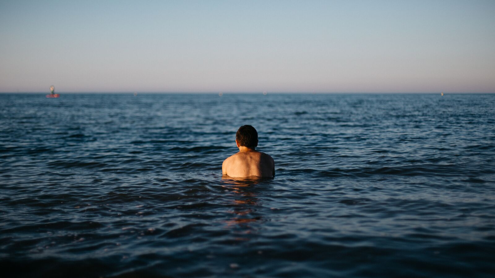 Canon EF 50mm F1.4 USM sample photo. Beach, man, ocean photography