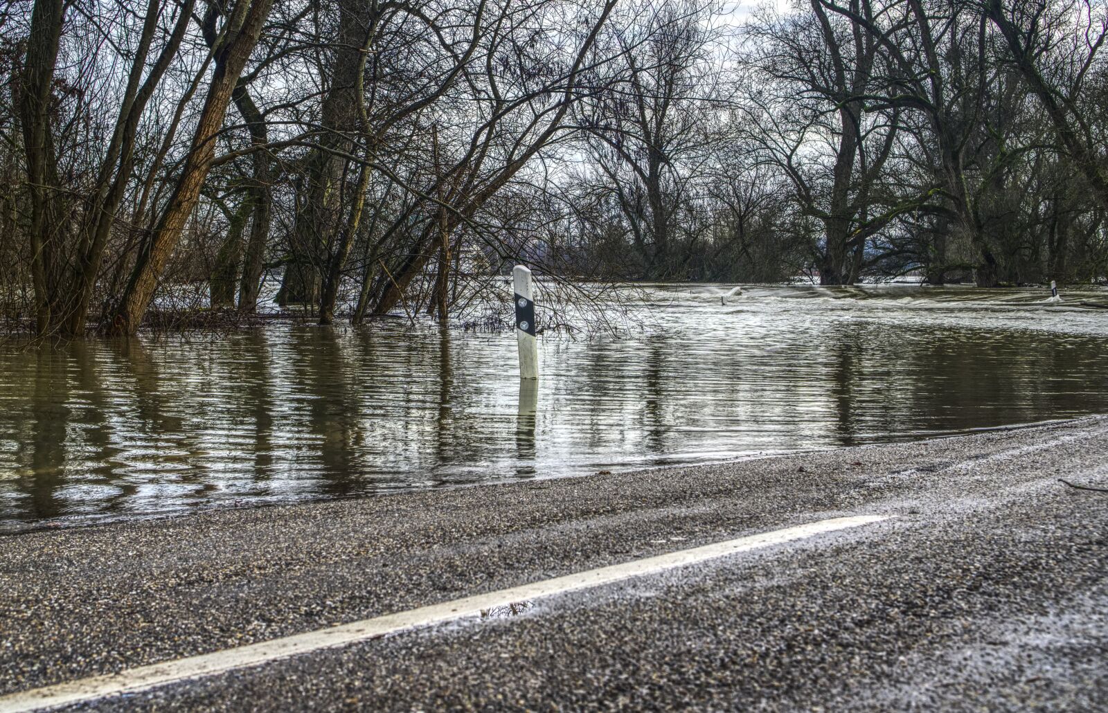 Sony a6000 + Sony E 35mm F1.8 OSS sample photo. High water, flow, river photography