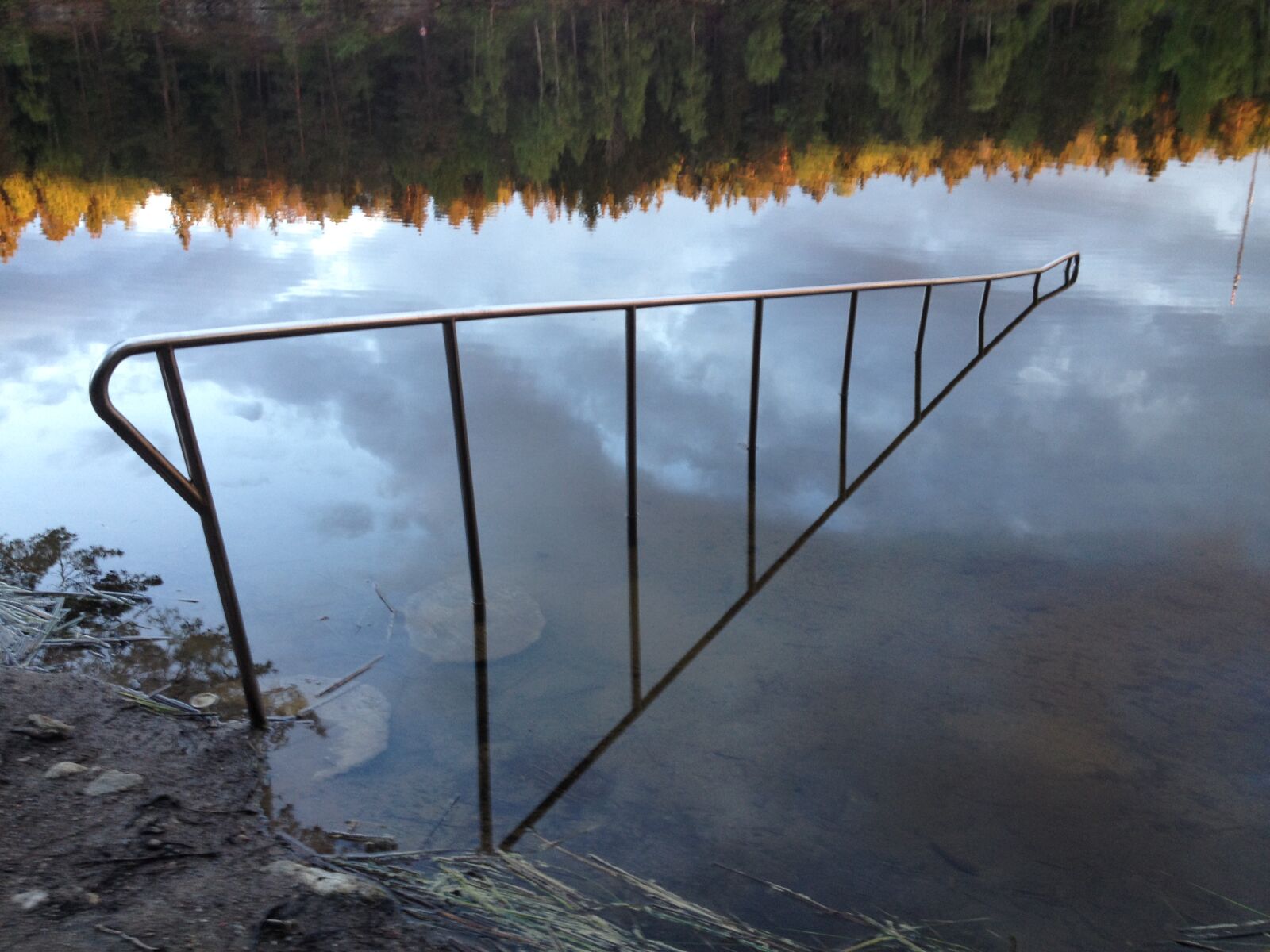 iPhone 4S back camera 4.28mm f/2.4 sample photo. Railing, sky, trees, water photography