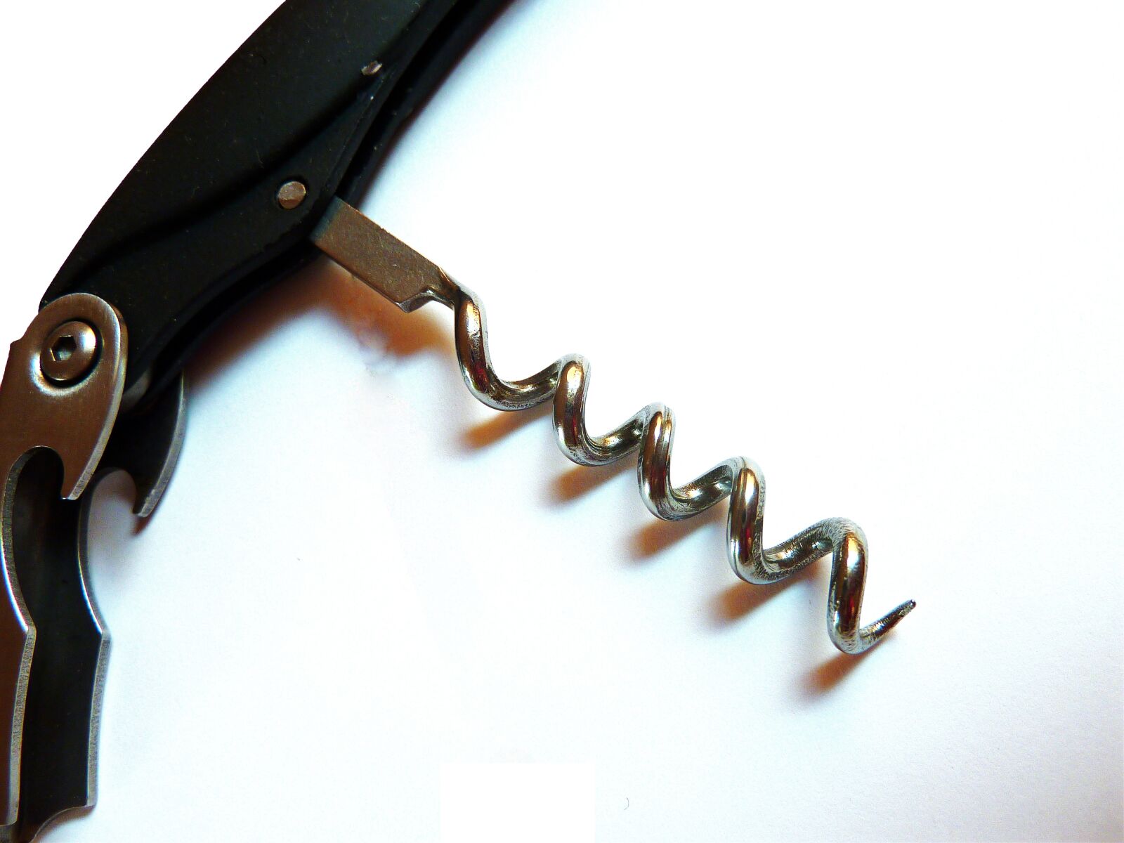 Panasonic DMC-TZ7 sample photo. Corkscrew, bottle opener, bottle photography