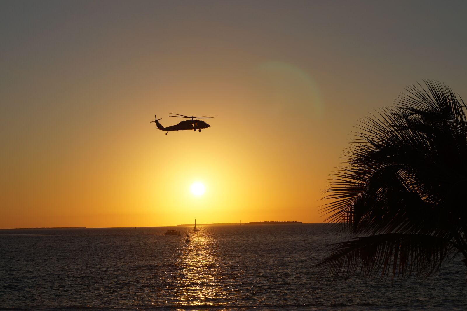 Sony DT 18-55mm F3.5-5.6 SAM II sample photo. Helicopter, sunset, key west photography