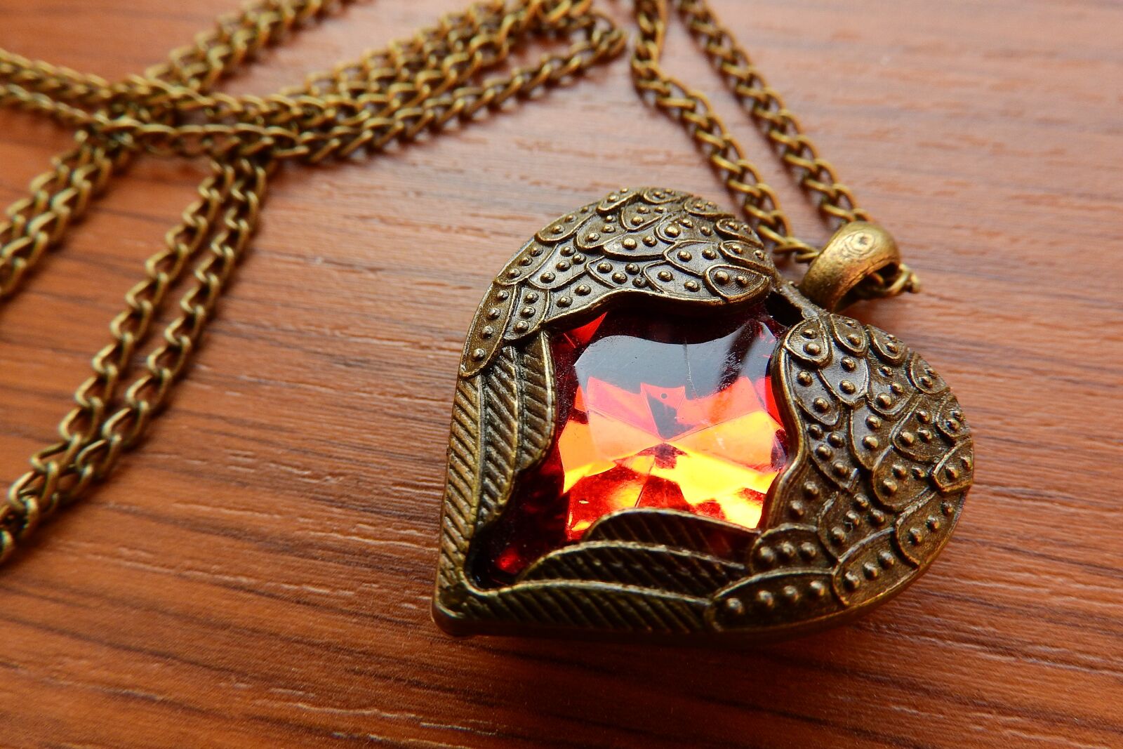 Nikon Coolpix P610 sample photo. Necklace with winged heart photography