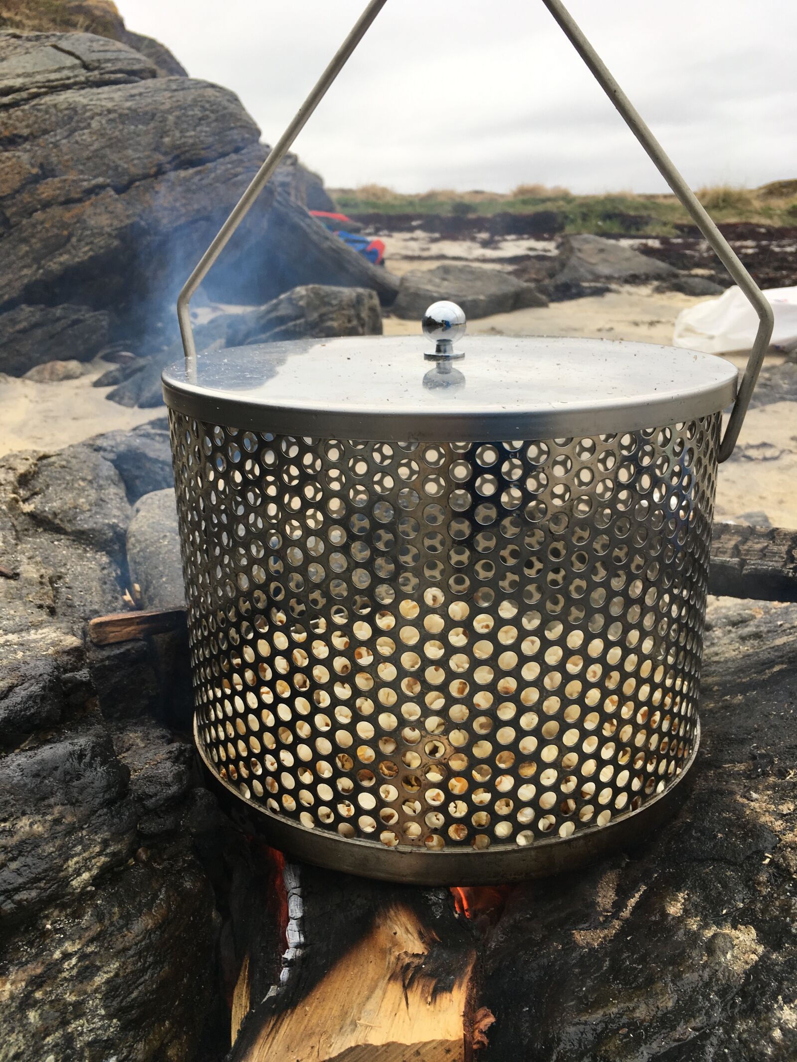 iPhone SE back camera 4.15mm f/2.2 sample photo. Popcorn, campfire, beach photography