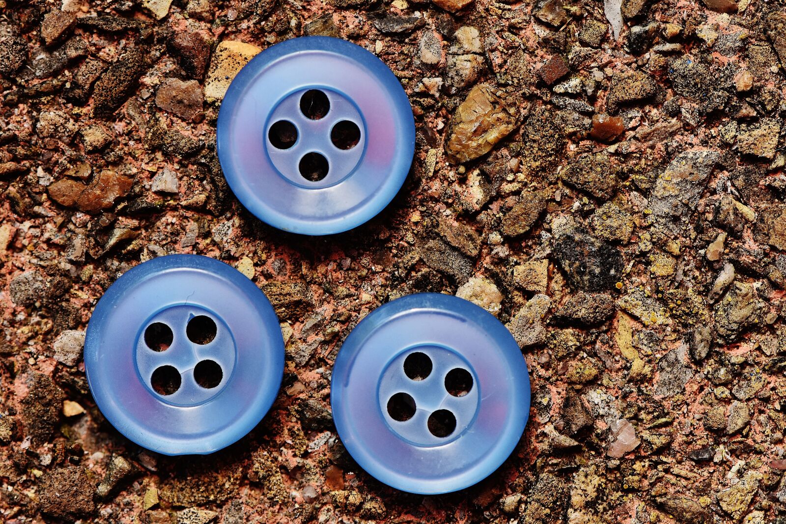 Nikon D7200 sample photo. Buttons, 4 holes, blue photography
