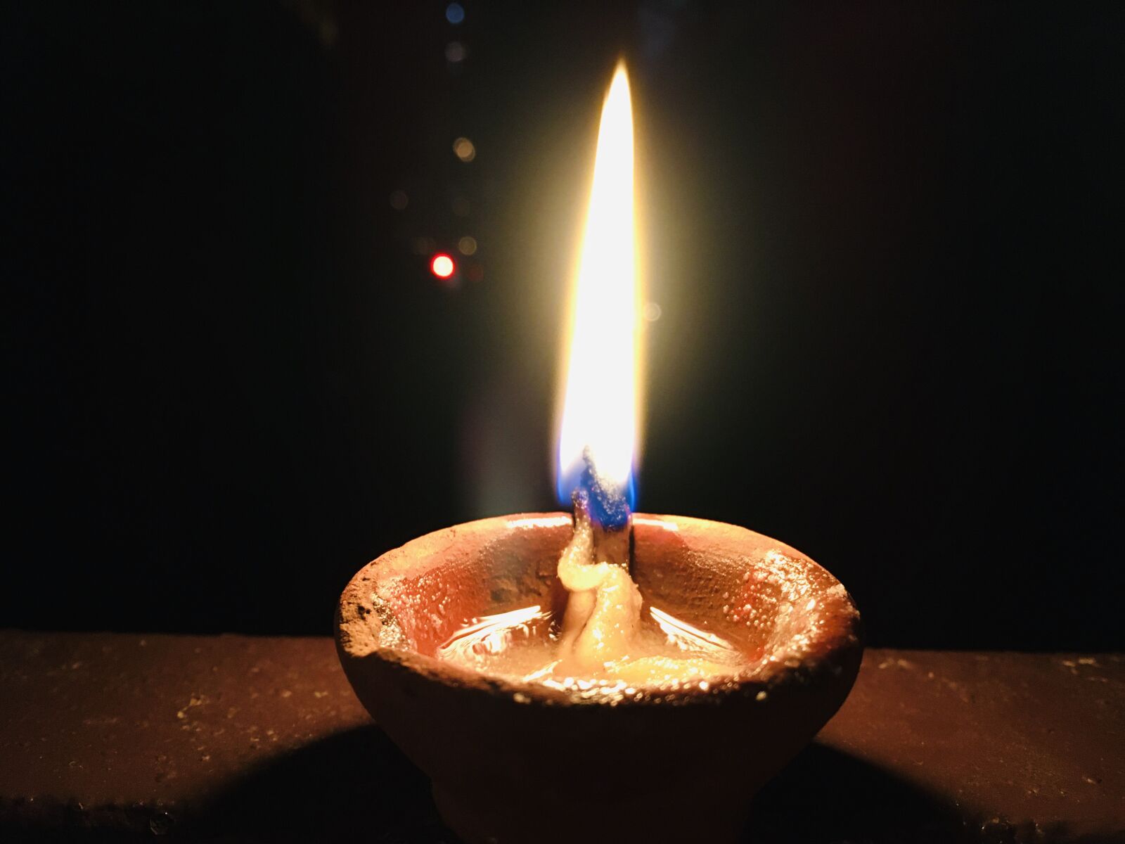 iPhone SE back camera 4.15mm f/2.2 sample photo. Light, diya, diwali photography
