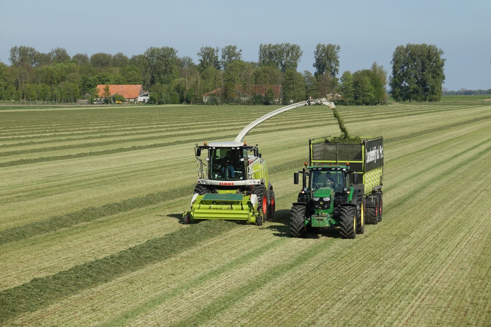 Sony Cyber-shot DSC-RX10 III sample photo. Grass, tractor, mow photography