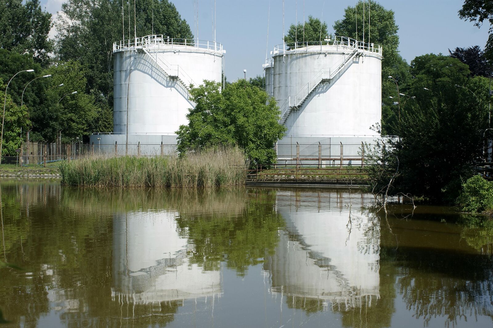 Sony Alpha DSLR-A290 sample photo. Pond, tanks, industrial photography