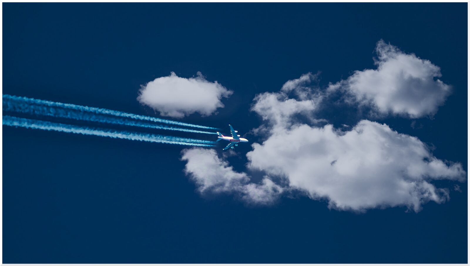 Canon EF75-300mm f/4-5.6 sample photo. Aircraft, cloud, sky photography