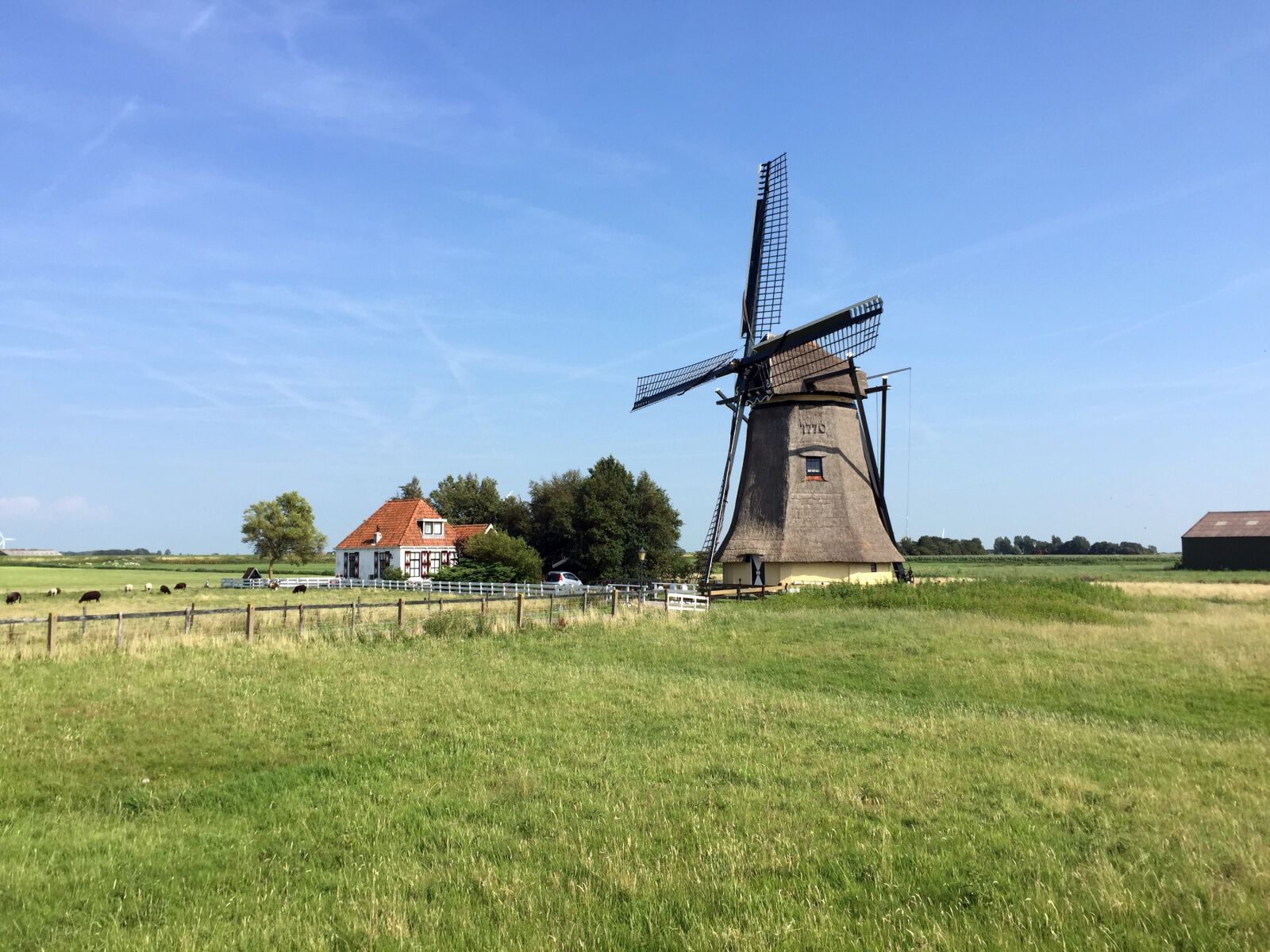 Apple iPhone 6 sample photo. Mill, netherlands, sky photography