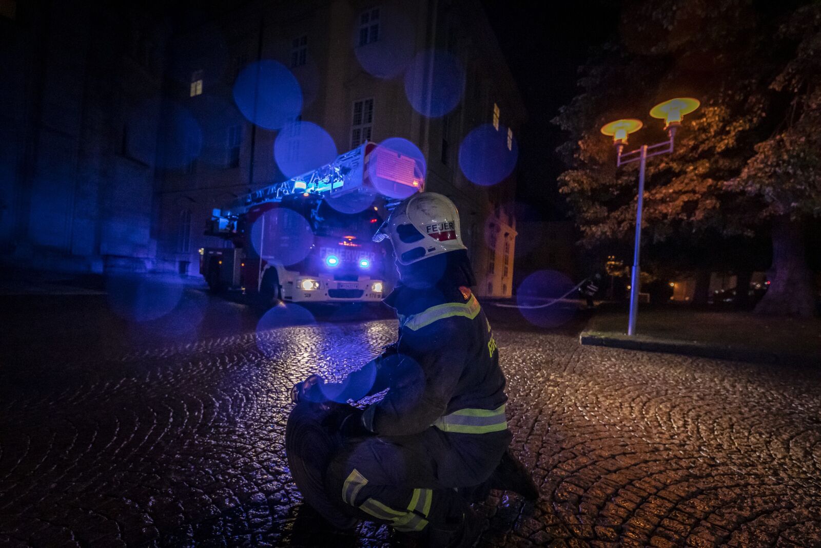 12-24mm F4 DG HSM | Art 016 sample photo. Firefighter, ladder, rescue photography