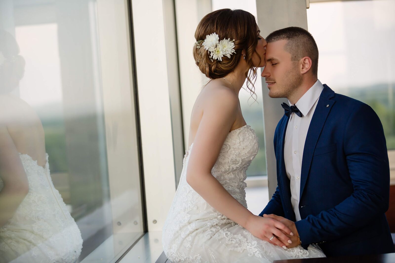 Canon EF 70-200mm F2.8L IS II USM sample photo. Bride, kiss, suit, wedding photography