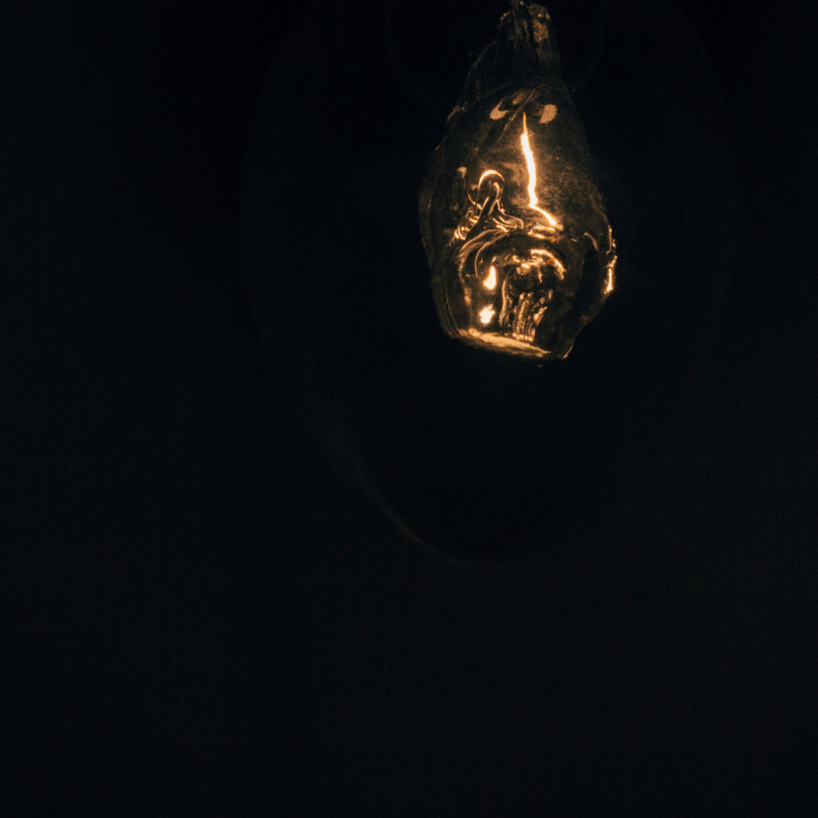 Canon EF 40mm F2.8 STM sample photo. Bulb, contrast, darkness, electricity photography