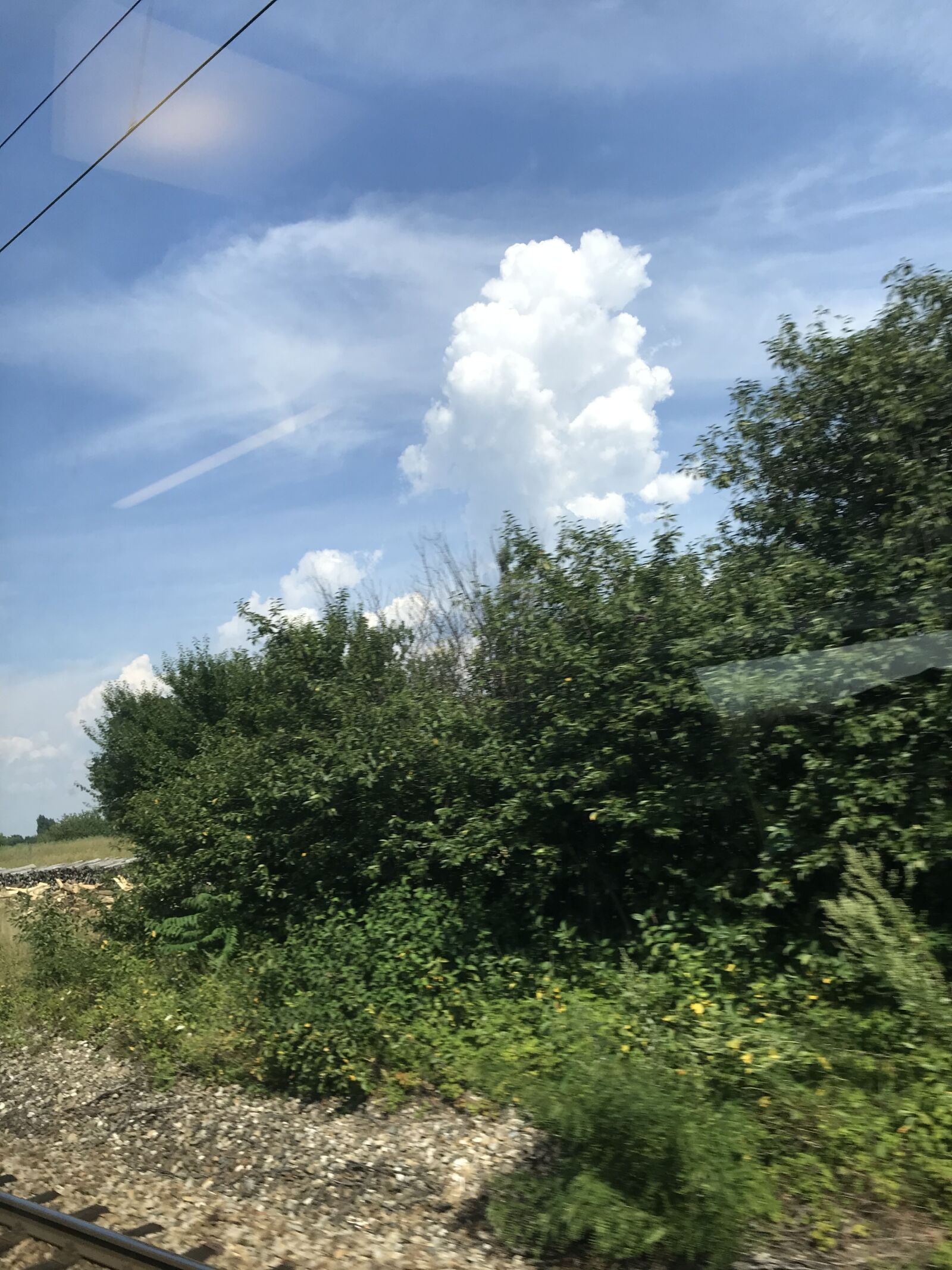 iPhone 7 back camera 3.99mm f/1.8 sample photo. Train, rail tickets, landscape photography
