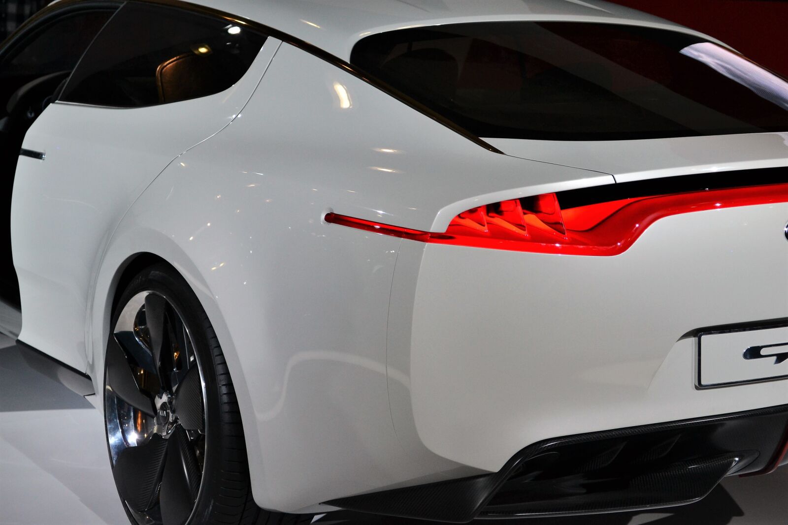Nikon D3100 sample photo. Kia sports car, rear photography