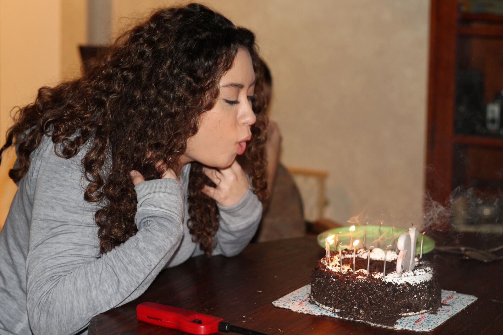 Canon EOS 1100D (EOS Rebel T3 / EOS Kiss X50) + Canon EF 50mm F1.8 STM sample photo. Birthday, blowing out candles photography
