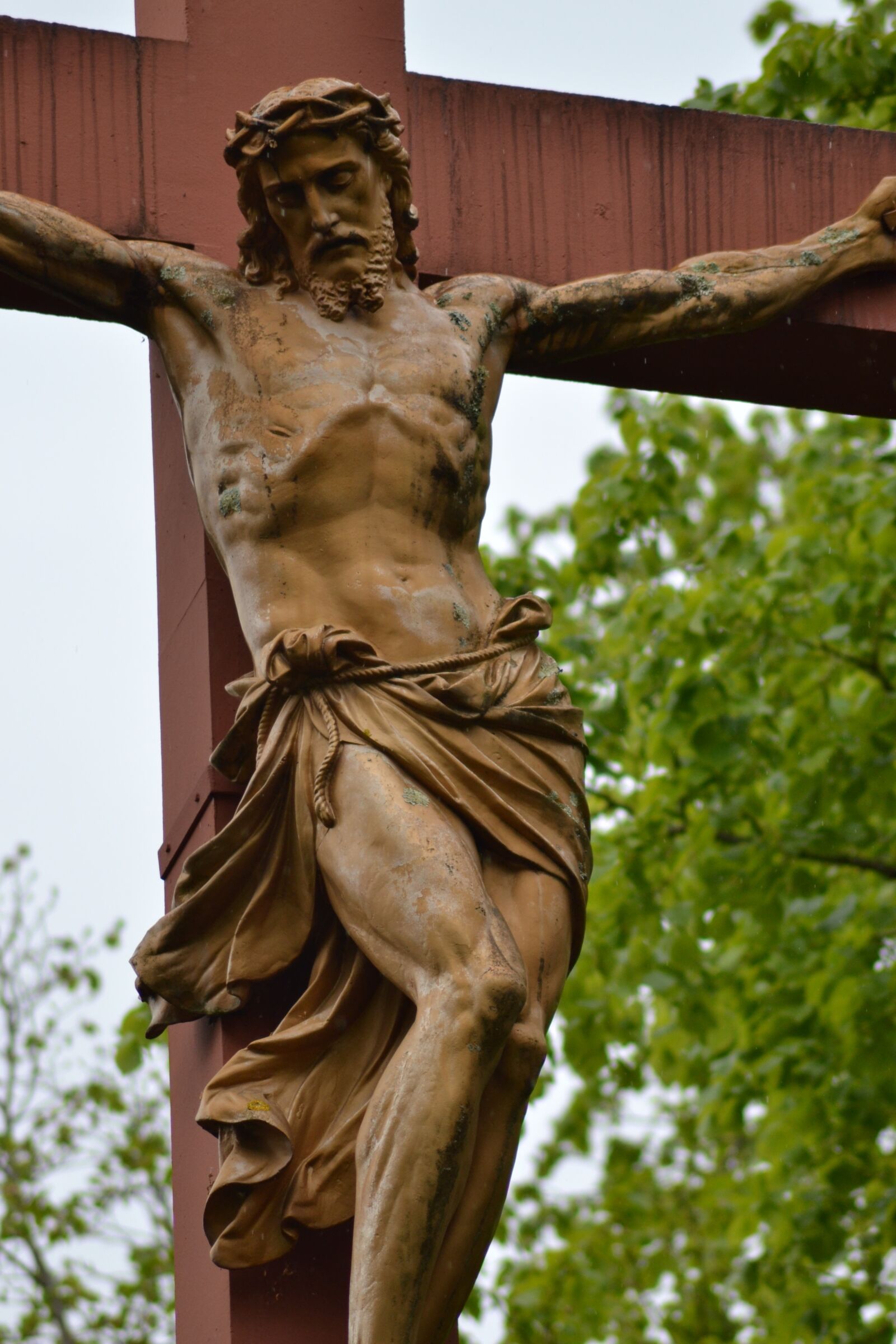Nikon D3100 sample photo. Statue, man, cross photography