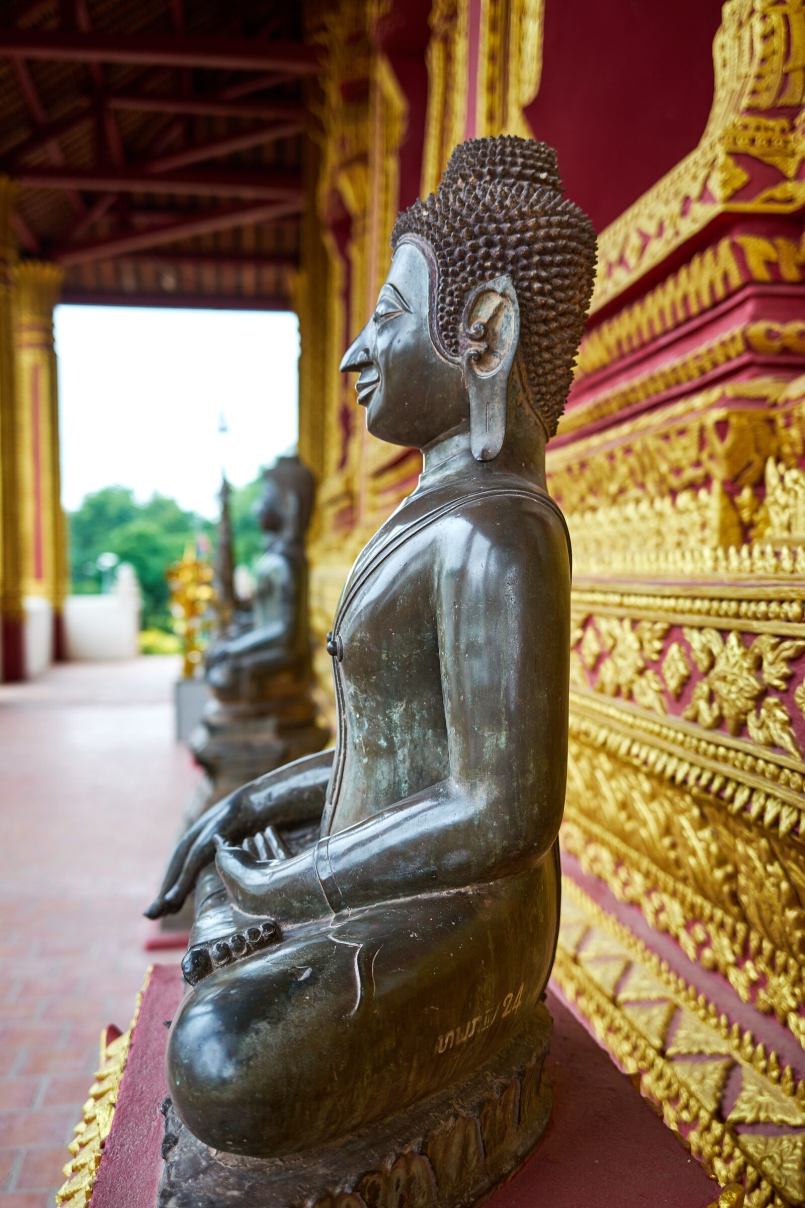 Sony a7 sample photo. Temple, monk, statue photography