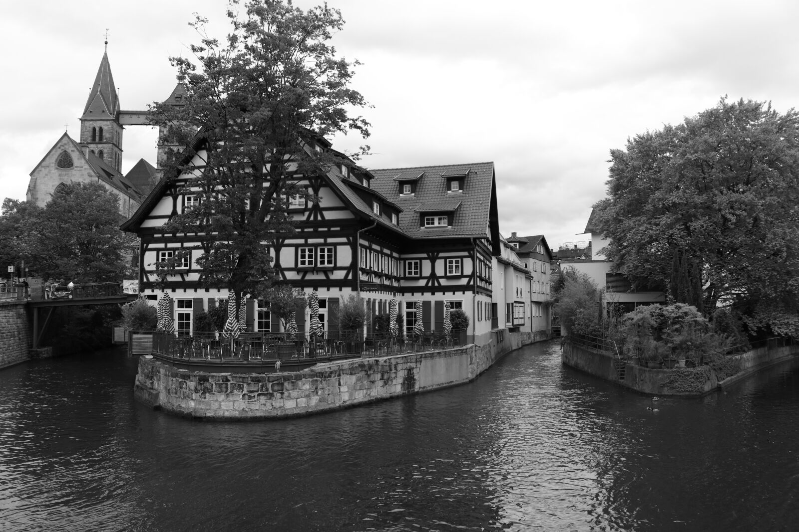 Canon EF-S 18-135mm F3.5-5.6 IS USM sample photo. Esslingen, river, black and photography