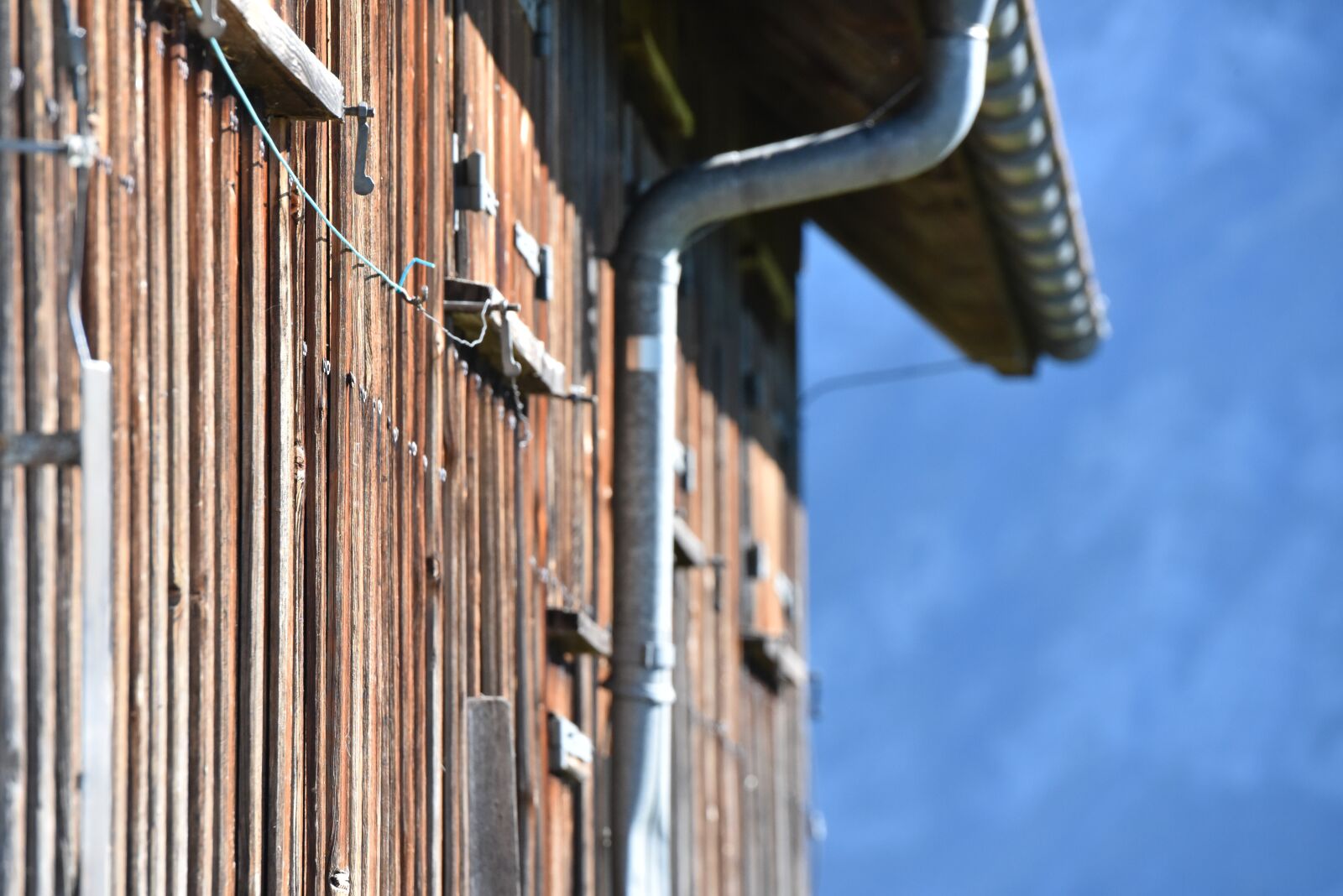 Nikon D750 sample photo. Alpine hut, wooden wall photography