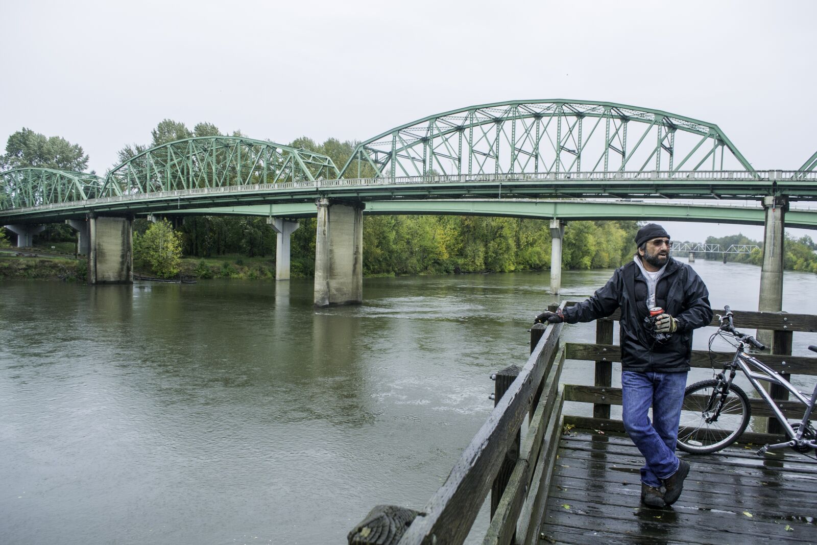 Nikon D3100 sample photo. Bridge, biker, river photography