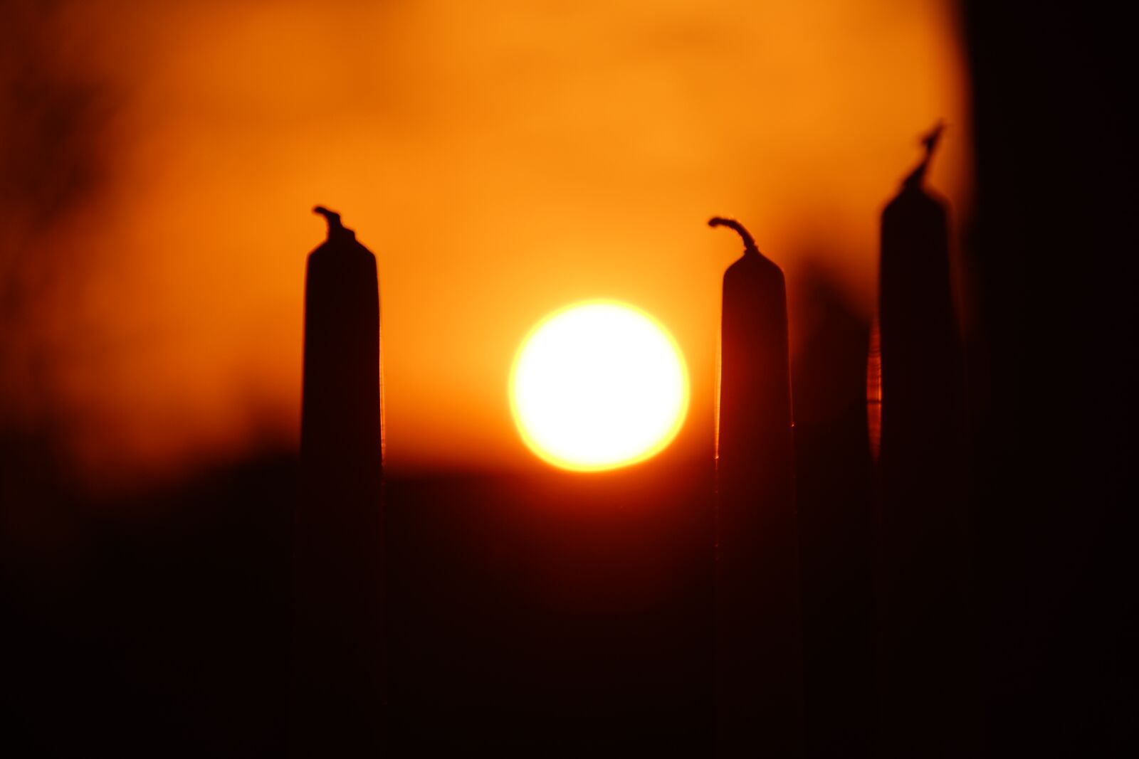 Sony DT 18-200mm F3.5-6.3 sample photo. West, candles, evening photography