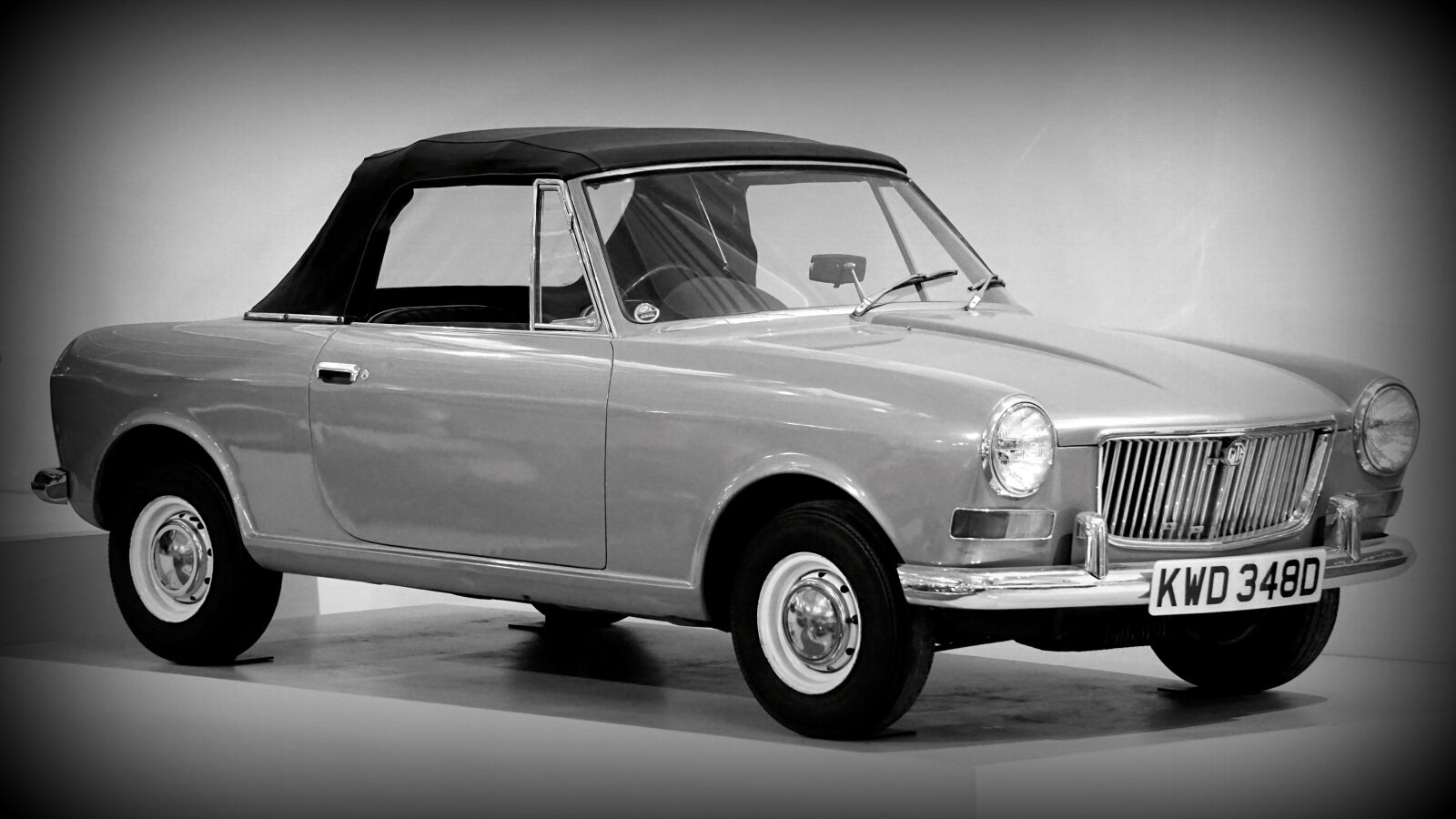 Sony E 55-210mm F4.5-6.3 OSS sample photo. Black and white, car photography