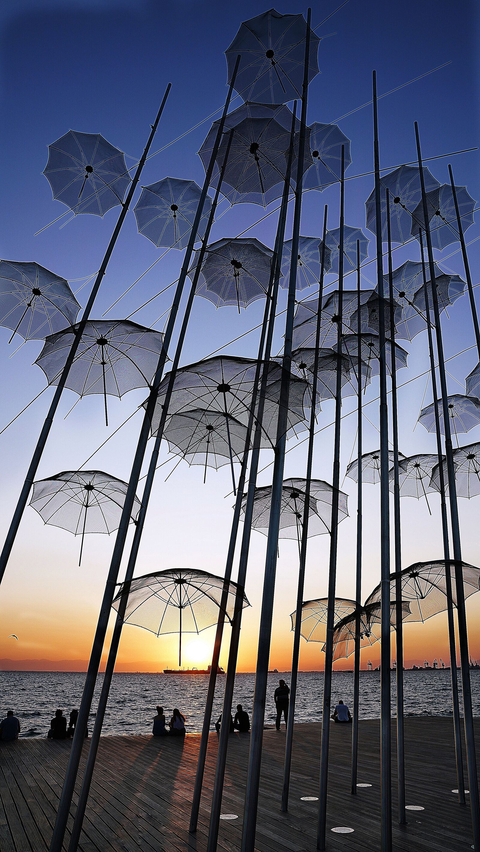 Sony a7R II + Sony FE 24-70mm F2.8 GM sample photo. Thessaloniki, umbrella, landmark photography