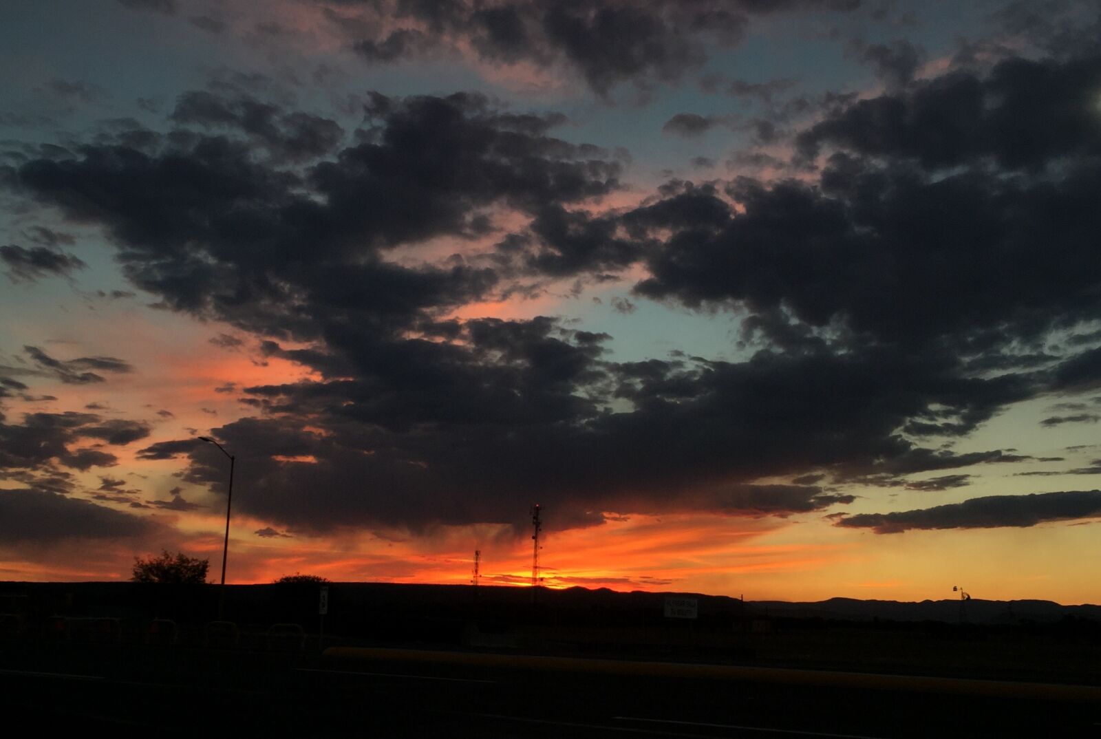 iPhone 6 back camera 4.15mm f/2.2 sample photo. Freeway, sunset photography