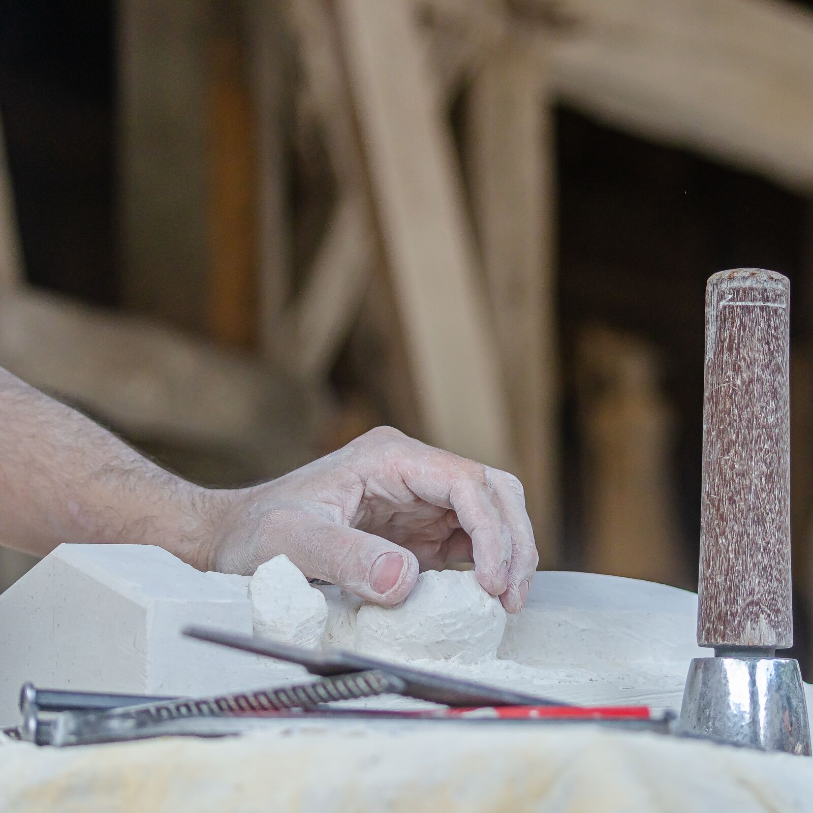 Nikon D7000 sample photo. Sculpture, sculptor, hand photography
