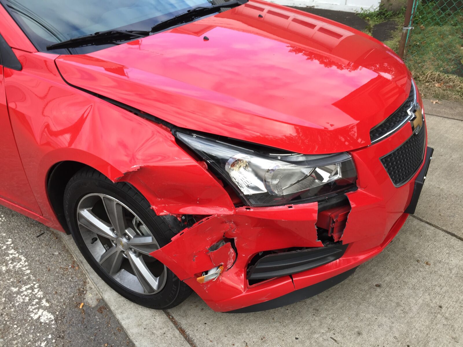 iPhone 6 Plus back camera 4.15mm f/2.2 sample photo. Car, crash, red photography