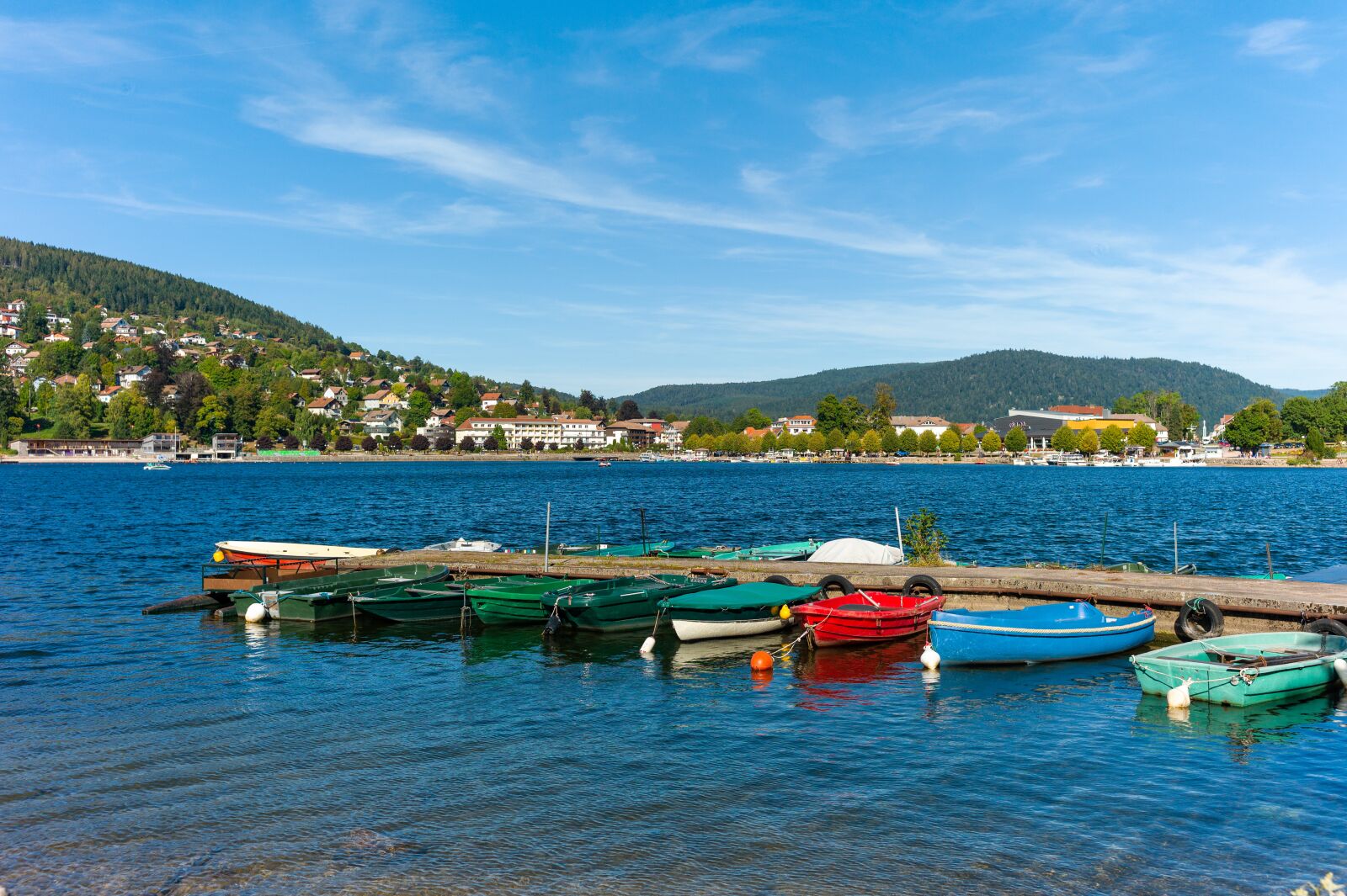 Leica M9 sample photo. Lake, mountain, canoes photography