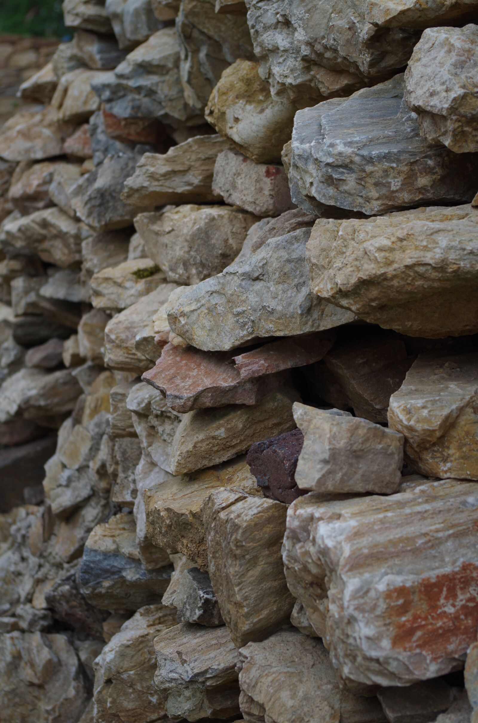 Pentax K-500 sample photo. Rocks, wall, stones photography