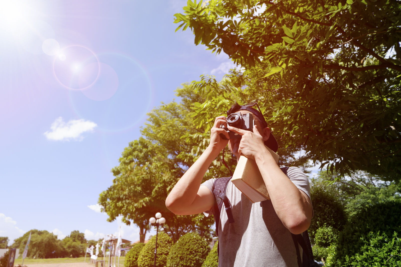 Fujifilm X-A2 sample photo. Backpack, backpacker, book, camera photography