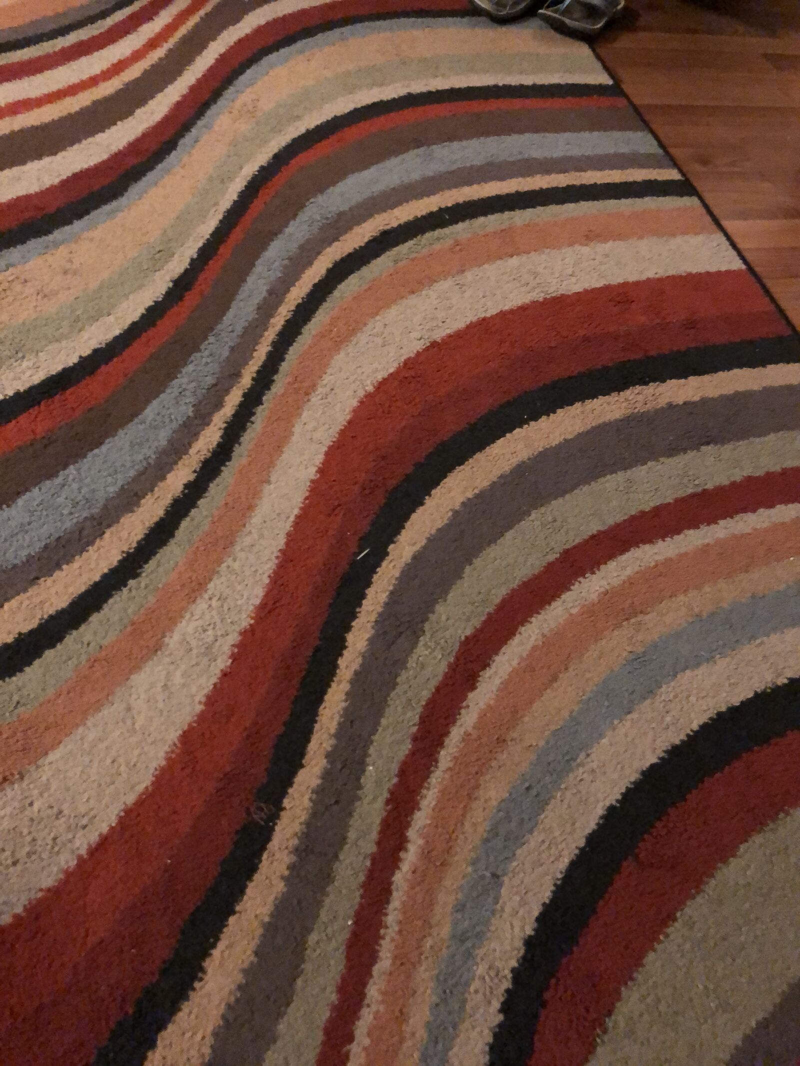 iPhone X back dual camera 4mm f/1.8 sample photo. Rug, floor, house photography
