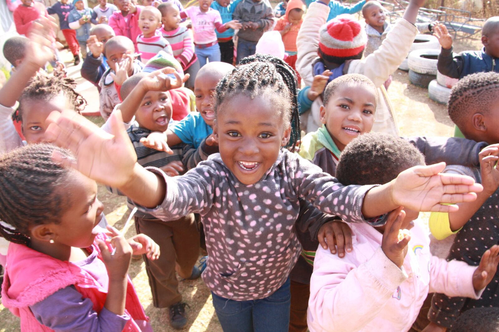 Canon EOS 1000D (EOS Digital Rebel XS / EOS Kiss F) sample photo. Soweto, village, happiness photography