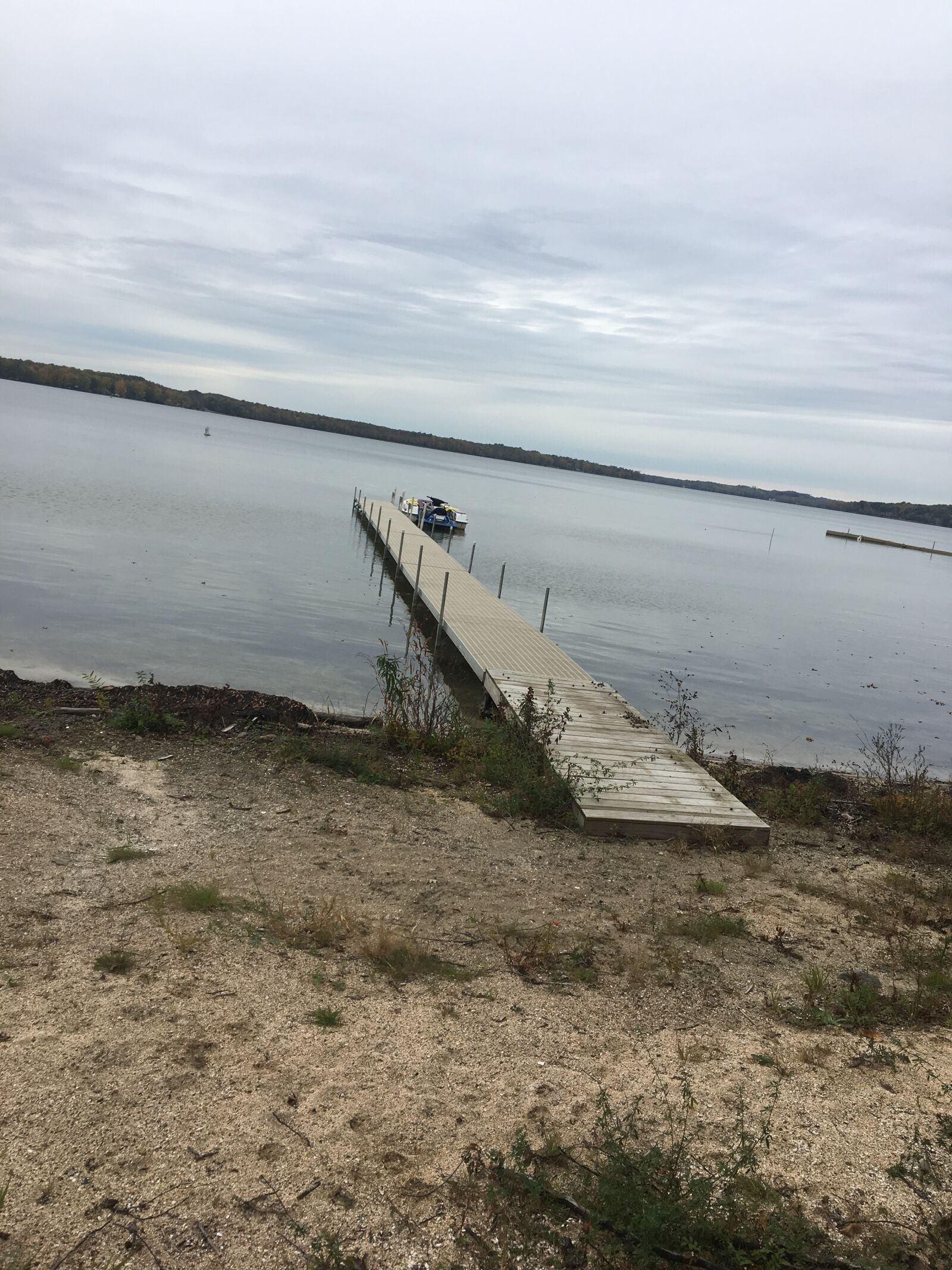 Apple iPhone 6s sample photo. Dock, lake, sky photography