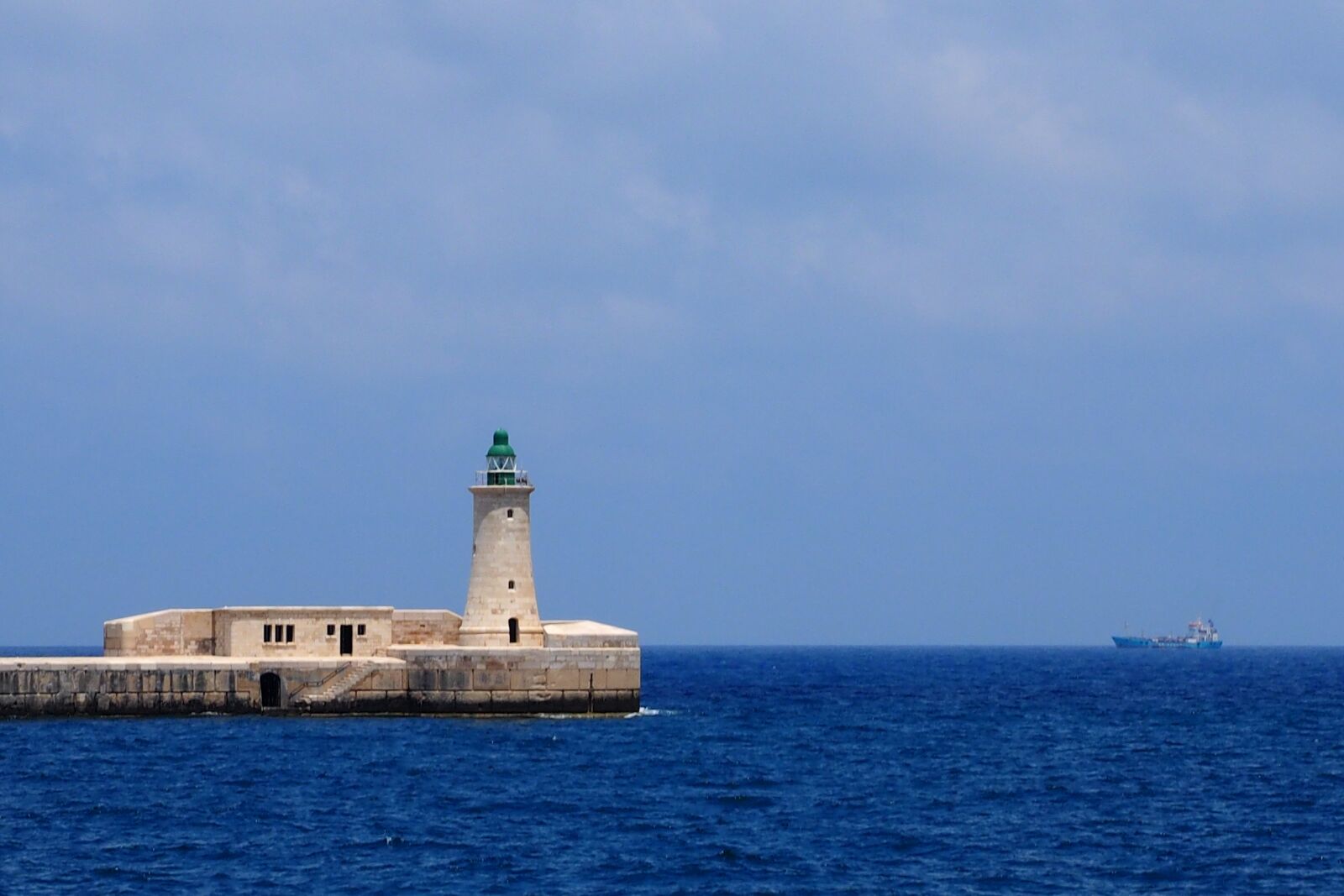 Olympus OM-D E-M1 + Olympus M.Zuiko Digital ED 12-40mm F2.8 Pro sample photo. Malta, lighthouse, sky photography